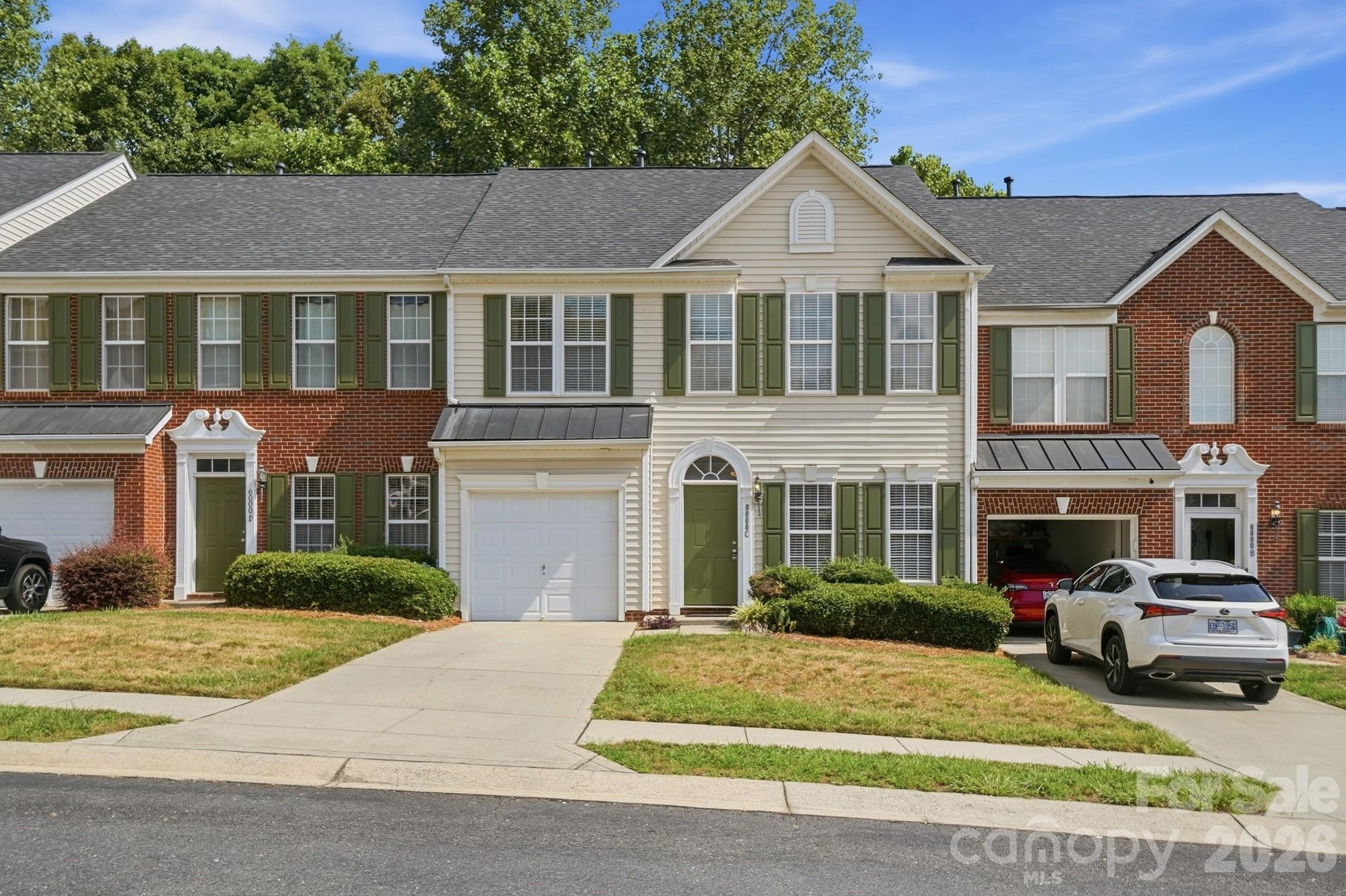 Location, comfort & convenience! This lovely townhouse in sought-after Cramerton Village is minutes from downtown Belmont, highways, 10 miles to the Whitewater Center & just 9 miles from the airport. Nestled in a quiet setting w/ wooded views, this 3-bed, 2.5-bath townhome offers impressive space & style. Brand NEW CARPET throughout!! The updated kitchen features granite counters, tile backsplash & hardwood floors. The primary bedroom boasts tray ceilings, a large WIC & a luxe bathroom w/ dual sinks, a frameless glass shower & tub. The other upstairs bath is tastefully renovated w/ tile floors & a modern vanity. Spend the summer on the backyard trex composite deck & patio area or drop by the communit pool for a swim. Enjoy low maintenance living while the HOA takes care of the exterior maintenance and front lawn/landscaping. The HOA fee also covers your water & sewer fees. Conveniently located between Cramerton, Belmont and McAdenville - each with their own charm, restaurants, shops and parks, this townhouse is ideally situated with tons of things to do nearby. Located just minutes to downtown Cramerton’s charming riverfront-where shops, restaurants & Goat Island park await!