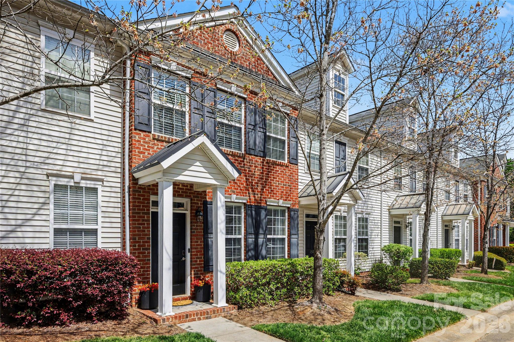 Welcome to this stunning townhome featuring two spacious primary suites, perfect for comfortable living. The light-filled lower level boasts laminate flooring and fresh, neutral paint. The cozy living room, complete with a gas fireplace, is ideal for relaxation, while a convenient half bath is available for guests. The well-appointed kitchen offers ample space for a dining table, a pantry, and newer stainless steel appliances. Direct access to a charming outdoor patio from the kitchen, perfect for entertaining or enjoying a morning coffee. Upstairs, you'll find the laundry closet conveniently located next to the two primary bedrooms, each with its own ensuite bath for added privacy. The primary suite features plush carpeting, a ceiling fan, and two spacious closets, providing plenty of storage. The second primary suite includes laminate flooring and its own ensuite bathroom, ensuring comfort for guests or family members. Take advantage of the exceptional Regent Park amenities, which include an outdoor pool, tennis courts and walking trails. Close to I-77, shopping, restaurants, Fort Mill Schools and more!