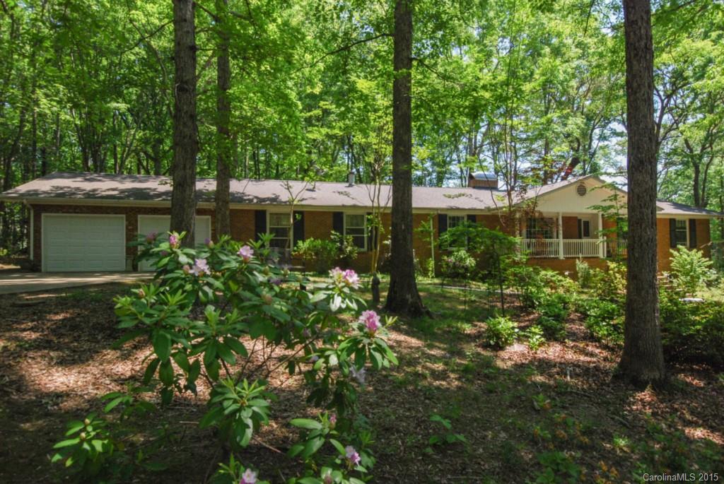 Lovely 4-bedroom ranch home in the heart of Matthews on a one acre lot.  Enjoy the outdoors in the private backyard and screened in porch.  Bonus/rec room off the garage is ideal for hobbies, sewing or a family room.  Right off of the rec room is a  large closed off office/hobby room. Oversized garage and workshop along with several large storage area in the home.  Home offers three wood burning fireplaces/woodstoves that heat the entire home! Flat backyard.
