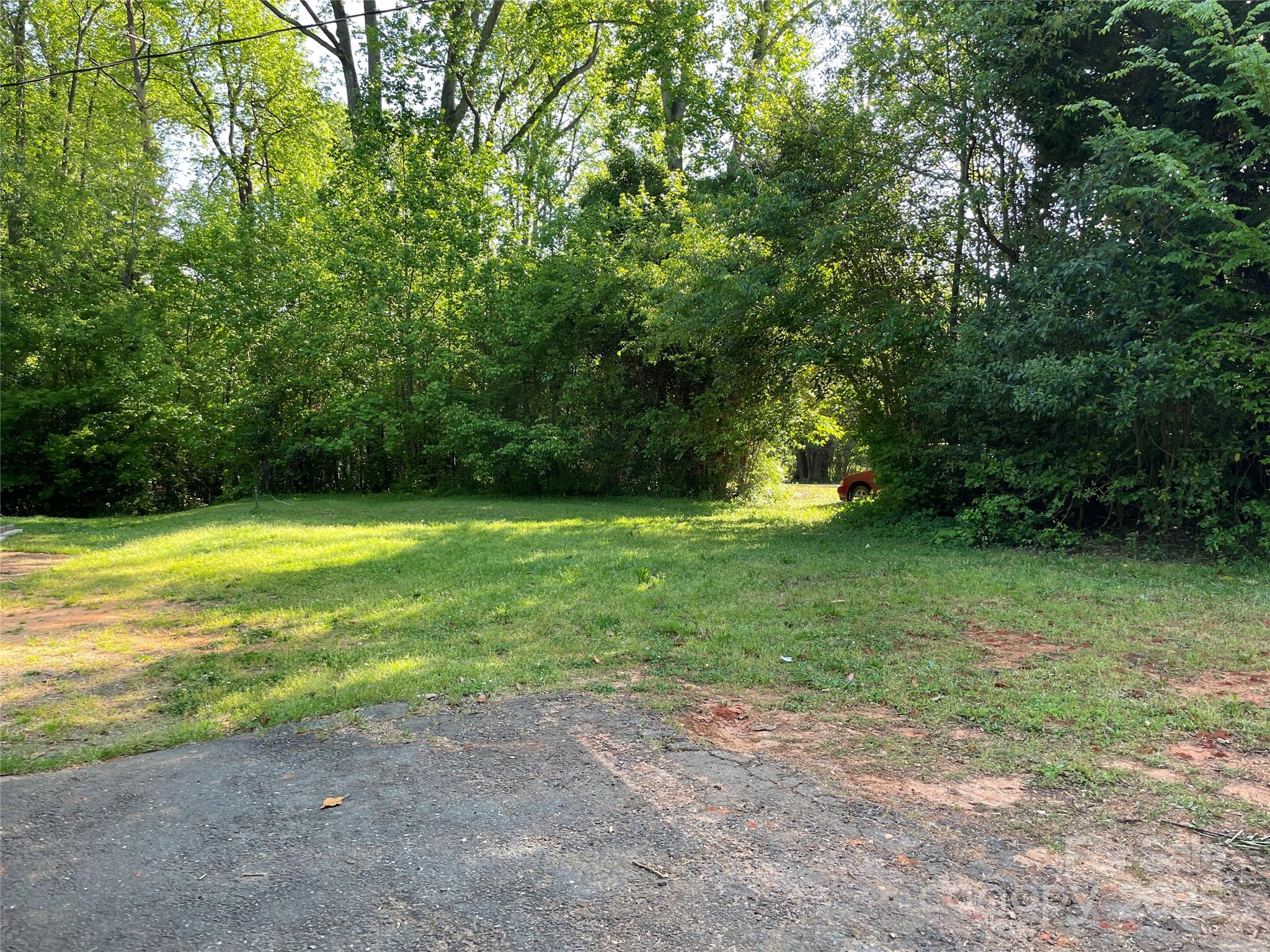 Incredible opportunity to own a professionally cleared and graded lot, ready for development! Whether you're an investor, builder, or future homeowner, this property offers a canvas for your next project.
Buildable lot – Ready for your vision-Professionally cleared & graded with mature trees left for privacy and beauty– Save time and costs - City water & sewer available - tap fees may apply - (Home previously on lot) - bring your plans and get started right away.