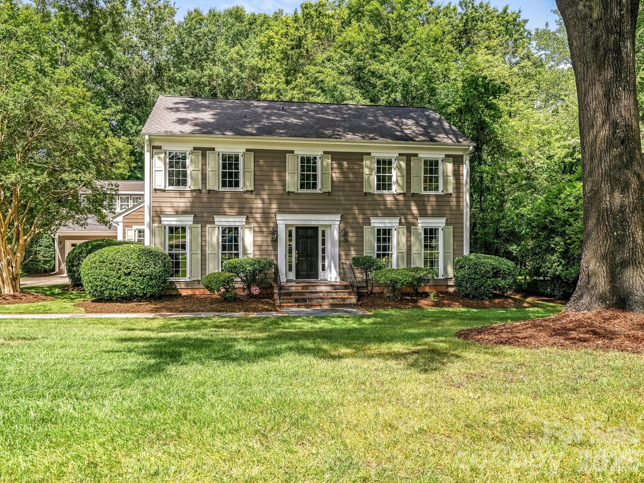 This charming and completely updated home ,situated on .42 acre , located in one of the most sought after neighborhoods. Open floor plan that offers ample living space and views of the beautiful backyard. Notable features include updated kitchen, laundry room, powder room, hall bathroom and primary bathroom, his and her closets and hardwood floors. The Sunroom provides ample sunlight with large windows that overlook the deck and private backyard.  The 4 car garage is conditioned with 1132 square feet with custom cabinetry and a sink.- great space for entertaining. There is a separate entrance above the garage that includes 828 square feet with  large spaces that include an area for beds with two large closets ,another area for a den/playroom/exercise room ,another space for a table or desk, plus built in custom cabinetry with a beverage refrigerator. The full bathroom has beautiful tile flooring, glass shower, custom vanity with neutral  stone countertops. Move in condition! This home will not last long on the market!