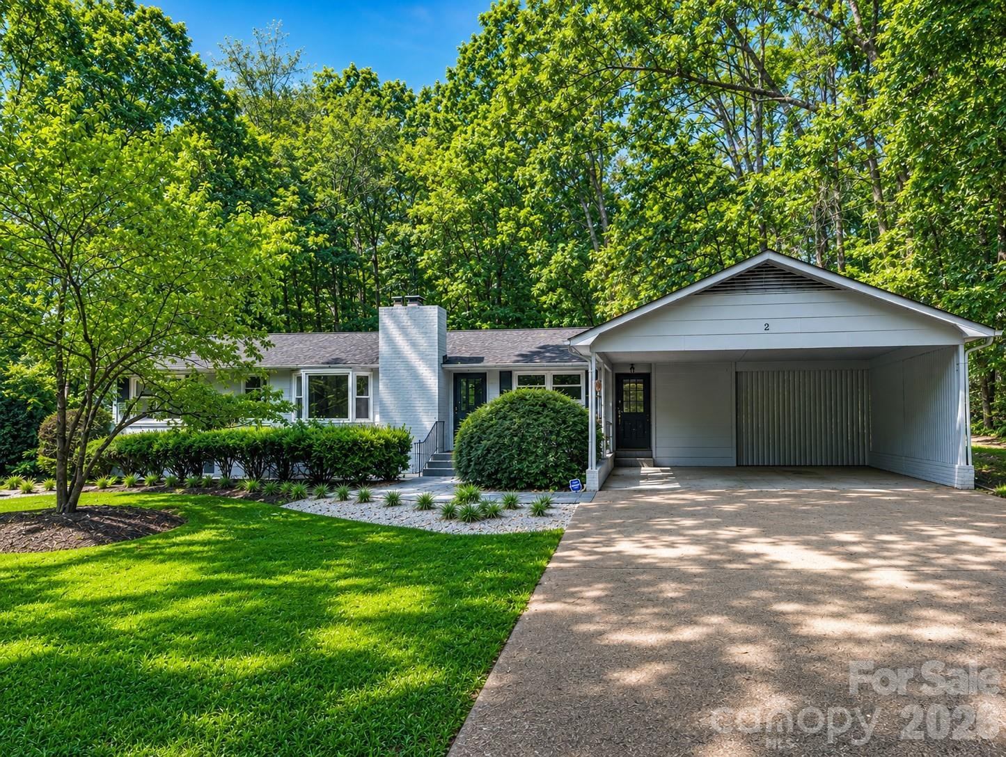 Welcome home to Forest Hills! This charming all-brick ranch is full of character, comfort, and timeless appeal—all tucked beneath a canopy of mature trees on a spacious, level lot in one of York's most established neighborhoods.

Step inside to discover beautiful hardwood floors flowing throughout the home, a light-filled living room anchored by a cozy gas fireplace and picturesque bay window, and an inviting dining area that's perfect for everything from weeknight dinners to holiday gatherings. The kitchen offers granite countertops, classic cabinetry, and easy access to the pantry and laundry room for everyday convenience.

The thoughtfully designed floor plan includes two spacious bedrooms and two full bathrooms, including a private primary suite that provides the perfect place to unwind.

Outside, you'll love relaxing on the covered back porch overlooking the peaceful backyard. A two-car carport and a walk-in crawl space with a concrete floor provide exceptional storage for tools, hobbies, and seasonal décor.

If you've been looking for low-maintenance, one-level living with charm, mature landscaping, and a fantastic location, this Forest Hills gem is ready to welcome you home!