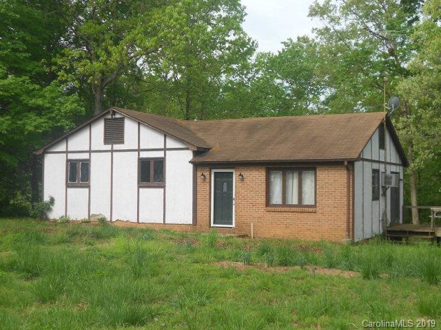 This 3 Bedroom, 1.5 bath has open living and dining area, nice sized yard, sliding doors open onto side deck, washer and dryer connection is located in the kitchen. Light restrictions. HOME SOLD AS IS.  TLC could bring this home back to life.  Nice neighborhood.  Call for a private showing today.