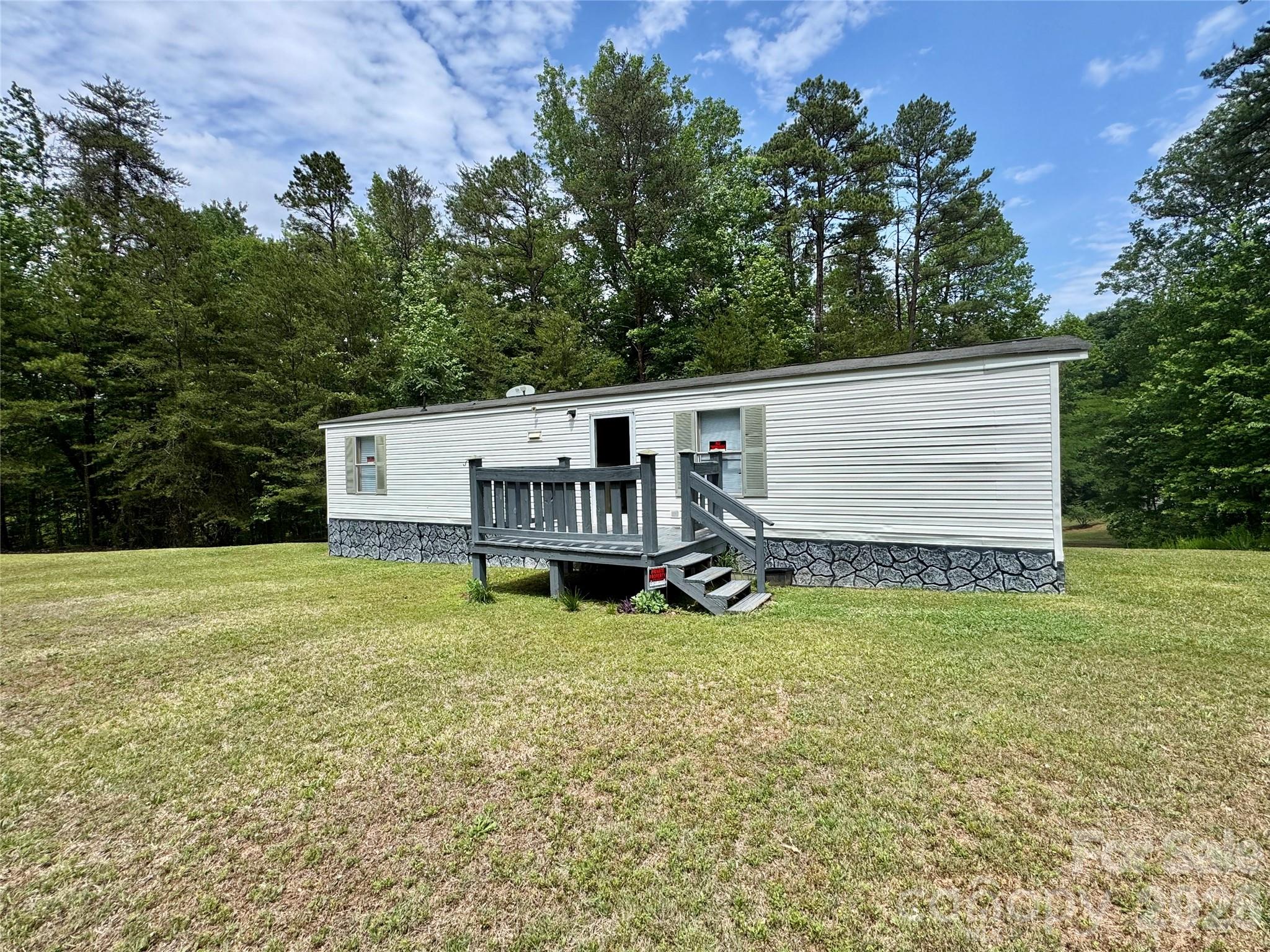 SELLER FINANCING AVAILBLE!! This 2-bedroom, 1-bath home offers a convenient location just 2.5 miles from Hwy 16 and approximately 16.5 miles from Charlotte. Property is currently tenant-occupied and is rented for $750/month on a month-to-month lease agreement. Shared well agreement is included in the attachments and will be recorded at closing. Seller is unsure whether the title has been retired. Use caution on the front porch, as several boards need replacement. Storage building does not convey; however, tenants are willing to sell it separately to the buyer.  Two hour lead time requested for showings.