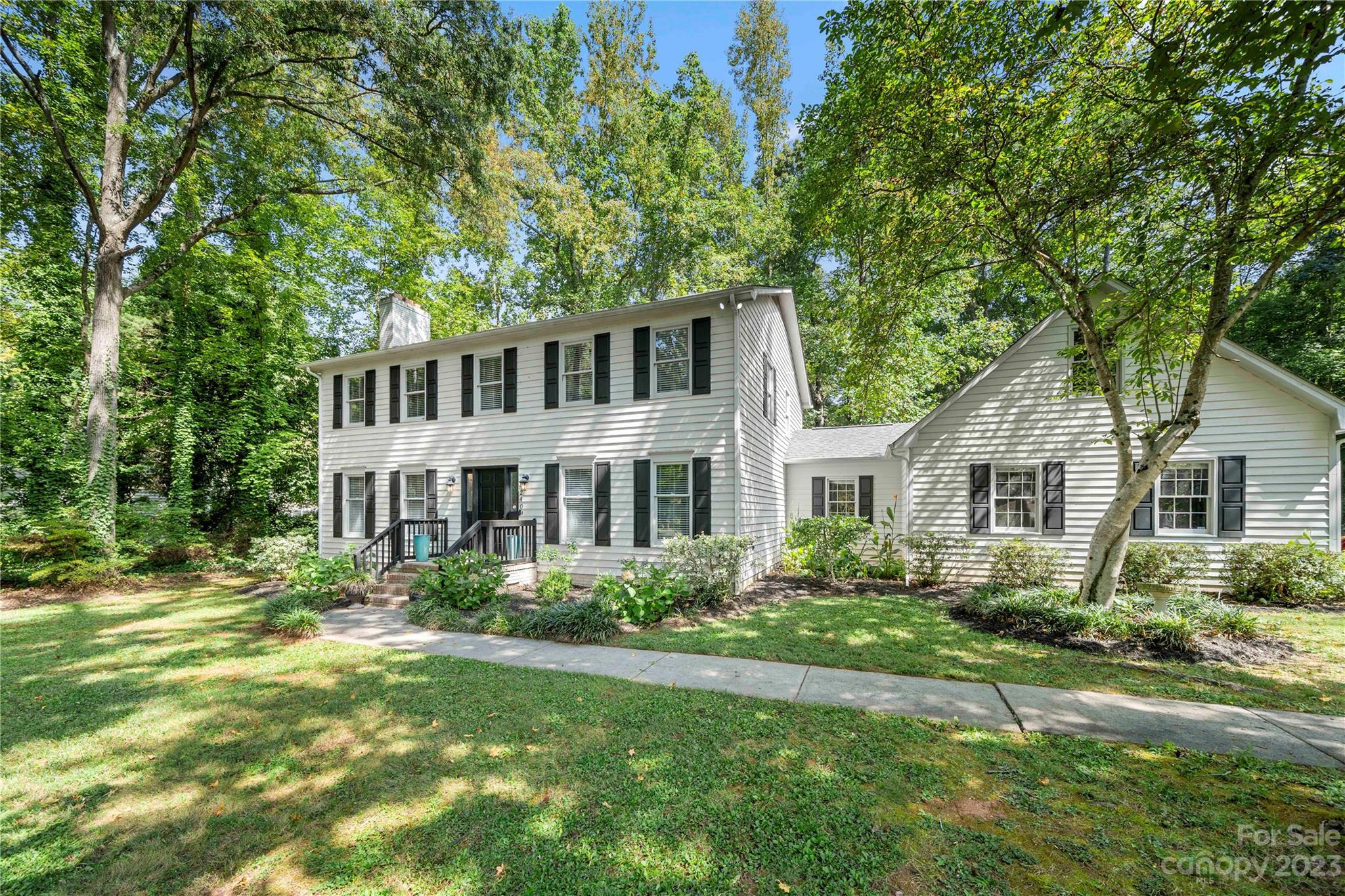Welcome to this stunning turn-key gem in the desired Wood Forest Neighborhood of Rock Hill! This home has four generously large bedrooms, one of which is downstairs with an attached half bath! All new flooring, paint, and light fixtures throughout the entire home. Large, open kitchen with a gourmet Dacor double gas stove, along with new dishwasher. Enjoy hosting with the extended driveway, covered back porch, backyard firepit and pathed walkway. The primary bedroom features two closets with an attached suite. Incredible location access to Rock Hill and Newport, yet tucked back with over half an acre of land. The large front and backyard gives you privacy from neighbors. There is a nook above the stairs foyer, perfect for a computer desk or designated pet area. Be sure to check out above the garage for a large storage or extra space. 2017 Roof & Upstairs HVAC, 2021 Downstairs HVAC, 2018 Water Heater