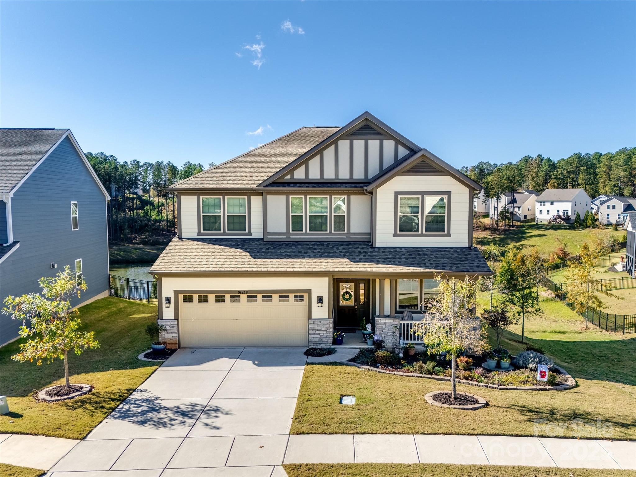 This charming home offers 5 bedrooms and 3.5 bathrooms situated on a water view lot! The main floor features a guest suite with a full bath, private office with another office space off the eating area, and spacious gathering room with a gas fireplace. The second floor includes the owner's suite with two walk-in closets and a spa-like bathroom with separate tub and shower, three additional bedrooms, a secondary bathroom, and a large loft area. Upgrades throughout the home include Energy Star Certified, 9ft ceilings on both floors, tapered range good, stainless steel appliances, and premium flooring and tile. Community amenities: outdoor pool, playground, clubhouse. Convenient access to Lake Wylie, shopping, restaurants, and more!