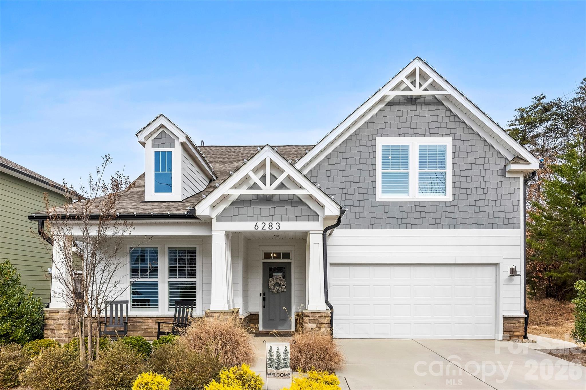 Missed it the first time? It’s back!
Discover this exceptional ranch-style home located at the end of a quiet cul-de-sac in highly sought-after Masons Bend in Fort Mill.  Surrounded by a serene wooded area, this residence offers rare privacy and a beautifully elevated living experience. Step inside to soaring 18-foot ceilings that create an impressive sense of space and natural light throughout the main living areas. The thoughtful floor plan features three bedrooms on the main level, providing effortless, functional living for all lifestyles. Upstairs, a private guest suite with full bathroom, and multipurpose room, offers the perfect retreat for visitors, an older child, or a dedicated home office. This home combines luxury finishes, architectural interest, and a prime setting—an outstanding opportunity. Agent is Owner
Ask about special lender incentives.