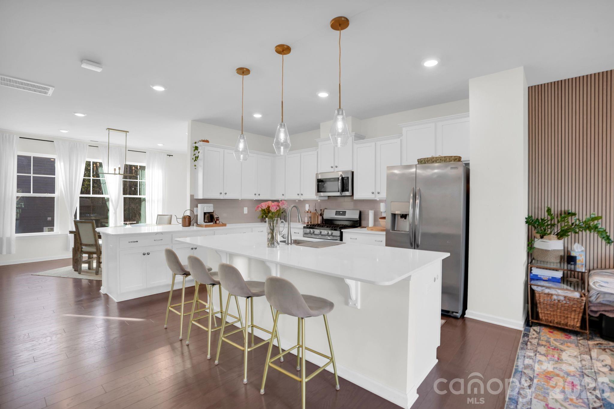Beautiful 4BR/3.5BA townhouse in the highly desirable Ballantyne area of Charlotte! Located in one of the city’s most sought-after communities, this home offers the perfect combination of convenience, top-rated schools, friendly neighborhood atmosphere.
Enjoy quick access to major highways and an easy 20-minute drive to Charlotte Douglas International Airport. The rapidly growing Ballantyne area features nearby restaurants, shopping, and playgrounds, making it ideal for today’s lifestyle.
Inside, you’ll find a bright and open floor plan with high ceilings, extra-wide staircases, and generous living spaces throughout. The oversized kitchen island anchors the main living area, providing ample space for cooking, entertaining, and gathering. The open-concept design creates a warm, connected feel from every level of the home.
The first floor features a private guest bedroom with a full bath—perfect for visitors or flexible living needs. The third level includes three spacious bedrooms, including a well-appointed primary suite with added privacy and open space behind the home, offering comfortable separation from neighboring properties.
With large rooms, abundant natural light, and a welcoming community known for its friendly neighbors this home presents an exceptional opportunity to own in Ballantyne.