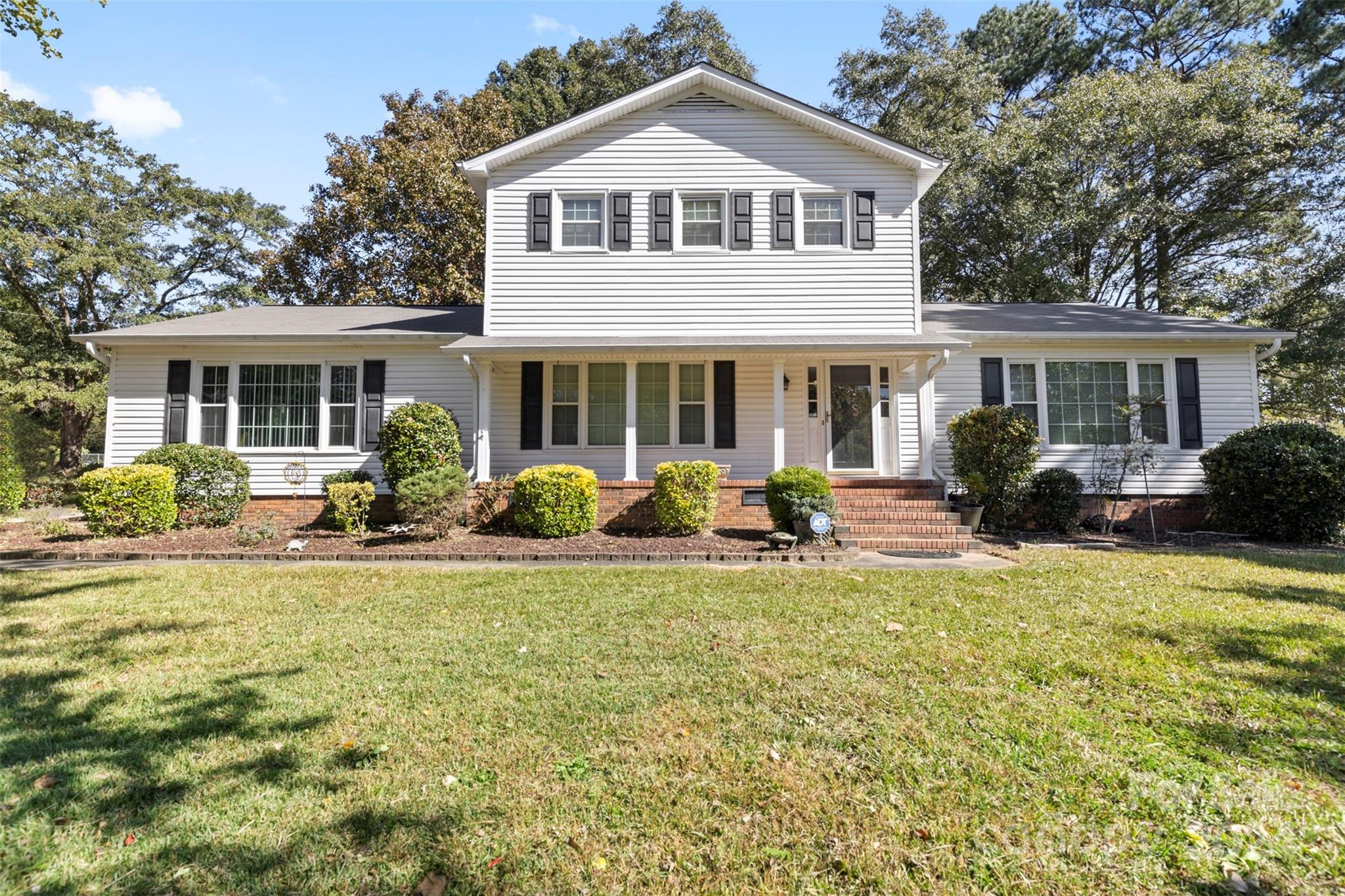 Traditional home with great curb appeal and southern charm on sprawling 1+ acre lot in Shandon, Rock Hill. Home is ready for your design and updates. Impressive and gorgeous brick surround masonry fireplace in cozy den. Crown molding in formal areas. Kitchen has granite counters, double wall ovens smooth top electric stove, breakfast room and pantry. Three bedrooms upstairs with ceiling fans. Garage converted to bonus room and heated and cooled. 3 separate dog pens. Gutter Guards installed. Use renovation financing to make this your dream home. These home sites are rare and offer the owner tremendous flexibility with no HOA.