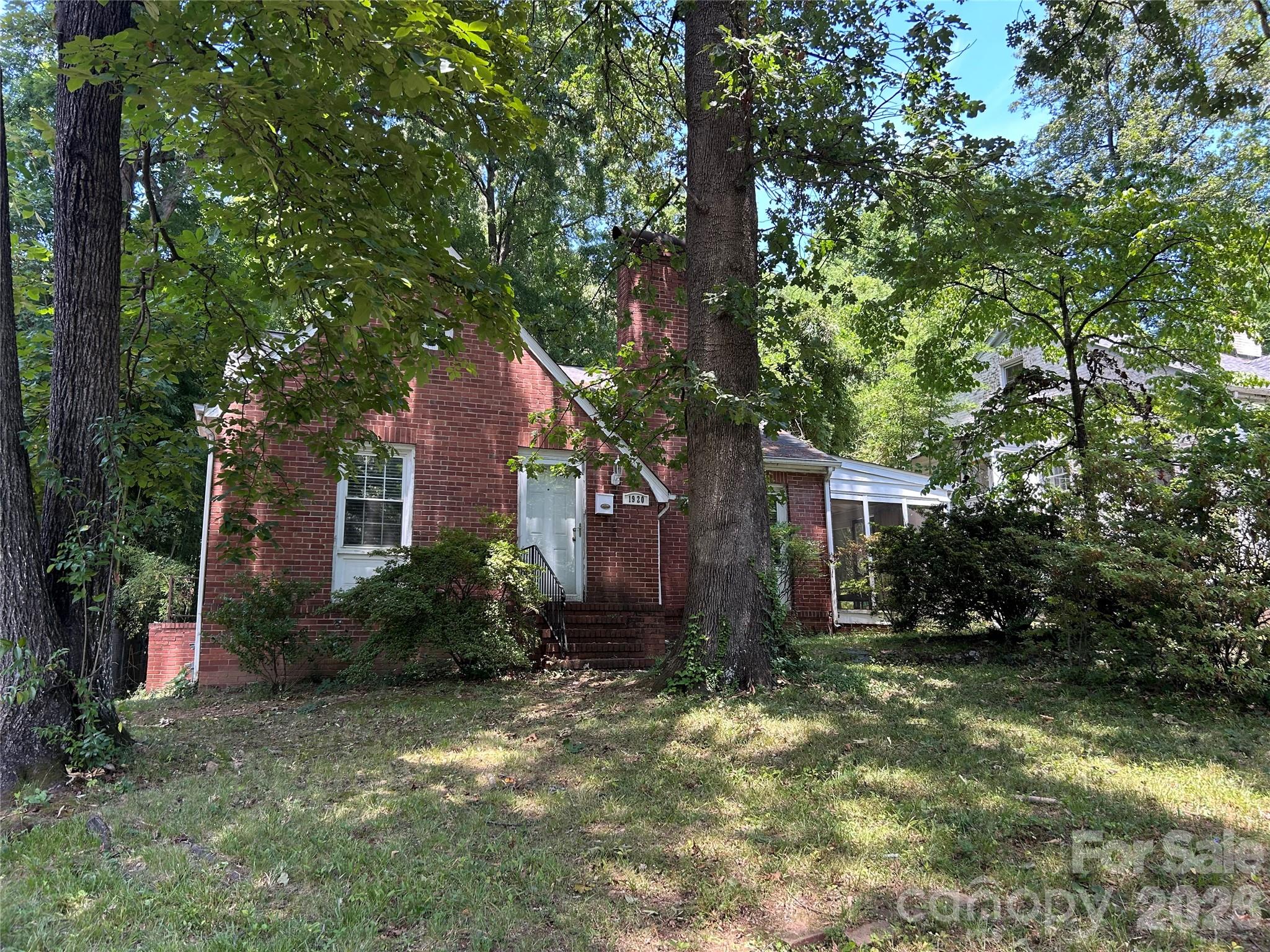 Investor Special in Historic Wilmore! This adorable and cozy bungalow is nestled in one of Charlotte's most desirable and charming historic neighborhoods. Located within the Historic Wilmore District, you'll enjoy easy access to the LYNX Blue Line, I-77, South End, Uptown Charlotte, local shops, restaurants, breweries, and Bank of America Stadium. Filled with character and potential, this home offers a rare opportunity to renovate, restore, or create your dream home in a highly sought-after location. A hallway staircase leads to an expansive 508-square-foot attic space, providing generous storage or exciting possibilities for future expansion, additional rooms, or a custom owner's retreat. Whether you're an investor, builder, or buyer with a vision, this property presents endless possibilities in one of Charlotte's most vibrant and walkable communities. Home is being sold As-Is, in its current condition.