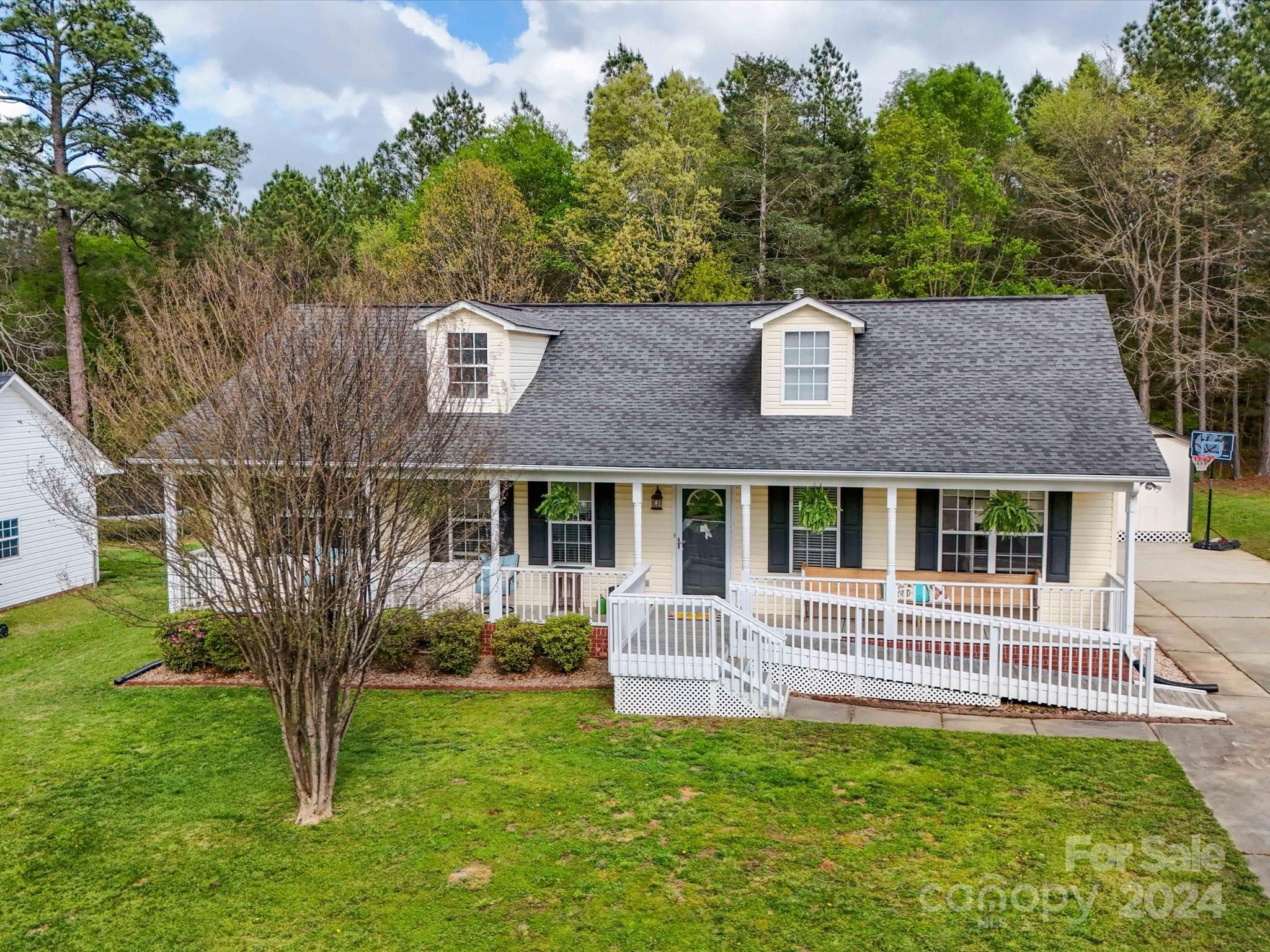 Welcome home to this beautiful 3 bed/2 bath ranch home located in Taylor Oaks. Move in ready & immaculately maintained, this home features white kitchen cabinets, a breakfast area, a huge great room with fireplace, a screen porch off of the kitchen and a great rocking chair covered front porch for easy entertaining. The split bedroom plan provides privacy and convenience and features a large Primary bedroom with huge walk-in closet & ensuite bathroom, then 2 other good size bedrooms. Do not miss the shed AND the separate storage building that has been wired with air conditioners. Sellers used the front part of this building as a homeschool classroom and the rooms as a workshop and storage. This prime location offers easy access to the interstate, schools & shopping. Don't miss out on this charming home!
