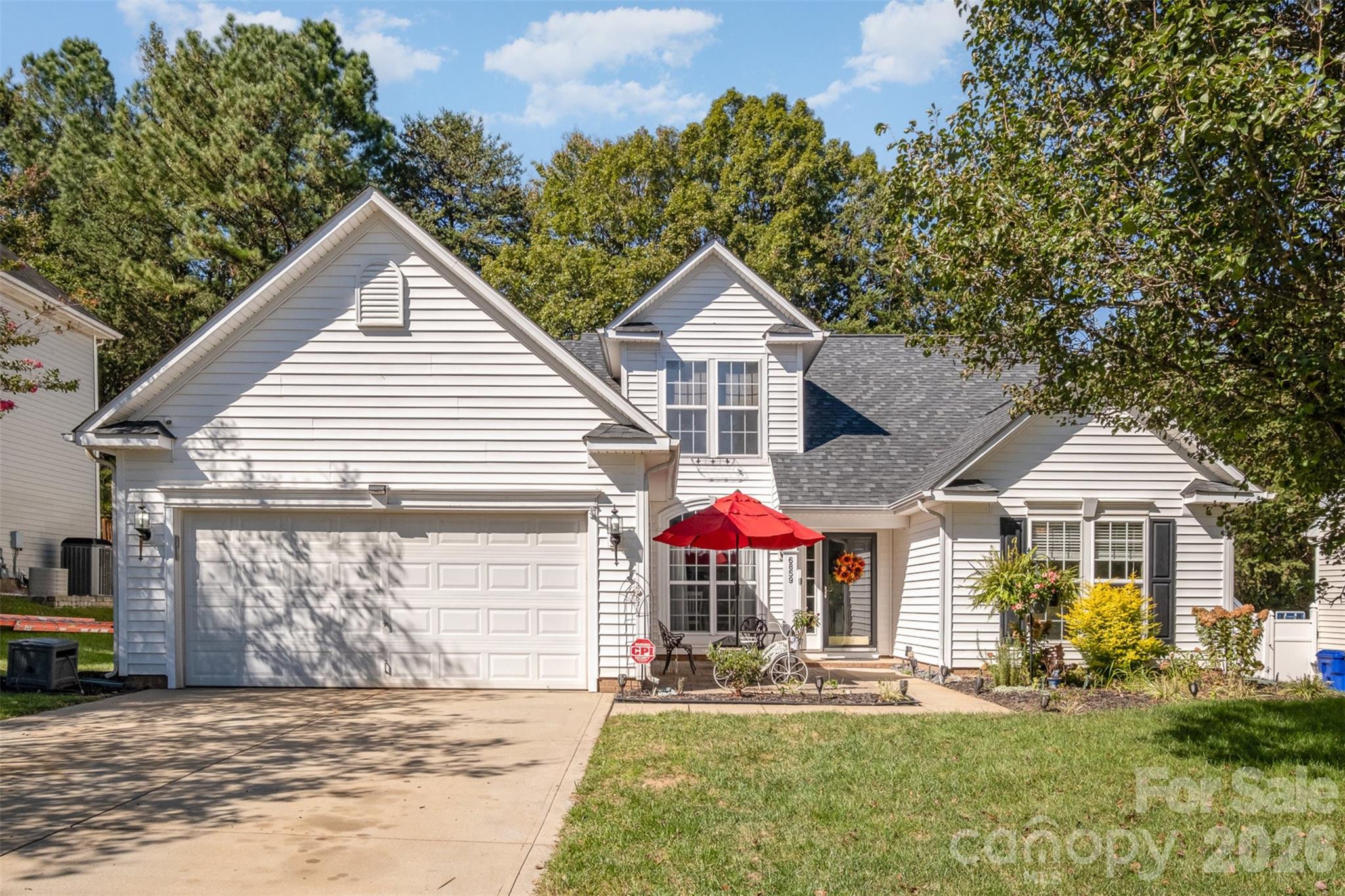 Welcome to Smithstone, one of Lake Norman's most sought-after waterfront communities — and this beautifully appointed Denver home is your invitation to the LKN life. Offering 3 bedrooms, 2 full baths, and a generous bonus room, this home blends everyday comfort with refined upgrades designed to impress. The open-concept main level is light-filled and thoughtfully designed, anchoring the space with a coveted main-floor primary suite and private ensuite — a rare and highly desired feature. The kitchen is built for both function and entertaining, featuring a gas double oven, stainless steel appliances, and granite countertops — all complemented by durable vinyl plank flooring that flows seamlessly throughout. Upstairs, the spacious bonus room adapts effortlessly to your lifestyle — home office, media room, fitness space, or all three.

Step outside to your covered outdoor living area, where a fully fenced yard provides the perfect backdrop for weekend gatherings or quiet evenings under the stars. A handsome front stone patio adds instant curb appeal and a warm welcome home. Beyond your front door, Smithstone delivers a true lakeside lifestyle: stroll scenic lakeside paths, take a dip at the community pool, or launch a day on the water with convenient Lake Norman access just moments away.

Move-in ready and priced to sell — this is lake living made attainable. Schedule your private showing today before this opportunity is gone. NOTE: SELLER IS OFFERING A 1-0 INTEREST RATE BUYDOWN THROUGH THEIR PREFERRED LENDER WITH AN ACCEPTABLE OFFER, subject to lender guidelines.