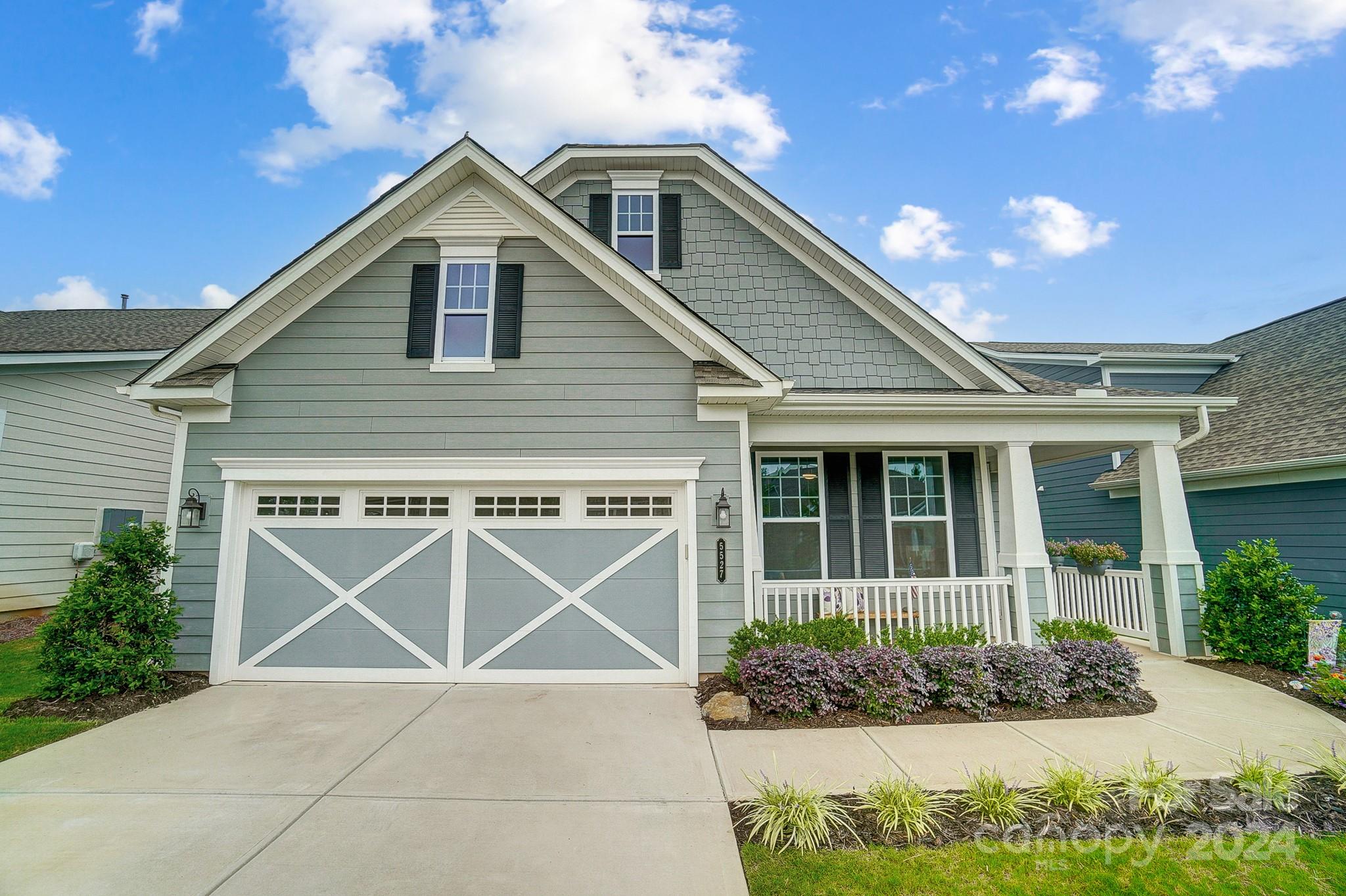 Bright and open floorplan, including sunroom you won't find in most! Windows and light abound in this like-new home, w enhancements already made so you can enjoy upgraded living now! Step out back to a fenced yard w extended hardscape, lanai w shades, and privacy from evergreens. You'll love gathering around the island in kitchen w GE Profile appliances, soft-close, gray cabinetry w pull outs, and spacious dining area open to living room! Gorgeous and durable LVP floors throughout w tiled bathrooms/laundry. Spacious primary suite boasts tray ceiling and beautiful bathroom w generous closet space. In addition to secondary bedroom and bathroom, this home has an office w fabulous built-ins including a murphy bed! What a smart, multi-functional space that can be used to accommodate overnight guests. Garage w 4' extension, epoxy flooring. Neutral paint throughout, upgraded light fixtures, smart switches and more! Phenomenal Cresswind amenities support an active, social and FUN lifestyle.