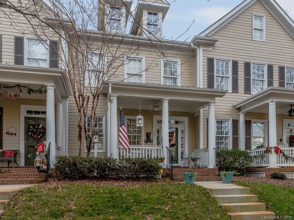 Lovely covered front porch will welcome you into this clean & neutral home. Detailed moldings & gas FPL make this living area elegant & cozy.  1/2 wall w/spindles separate dining area from living area.  Kitchen w/crisp white cabs & white appls. plus eat-at bar area.  Lots of windows provide sunny natural light.  2 BR up, each w/full BA, one w/office/desk built in closet for convenience.  Enjoy the brick paver patio out back which is fenced for privacy.  Baxter location provides lots to do.