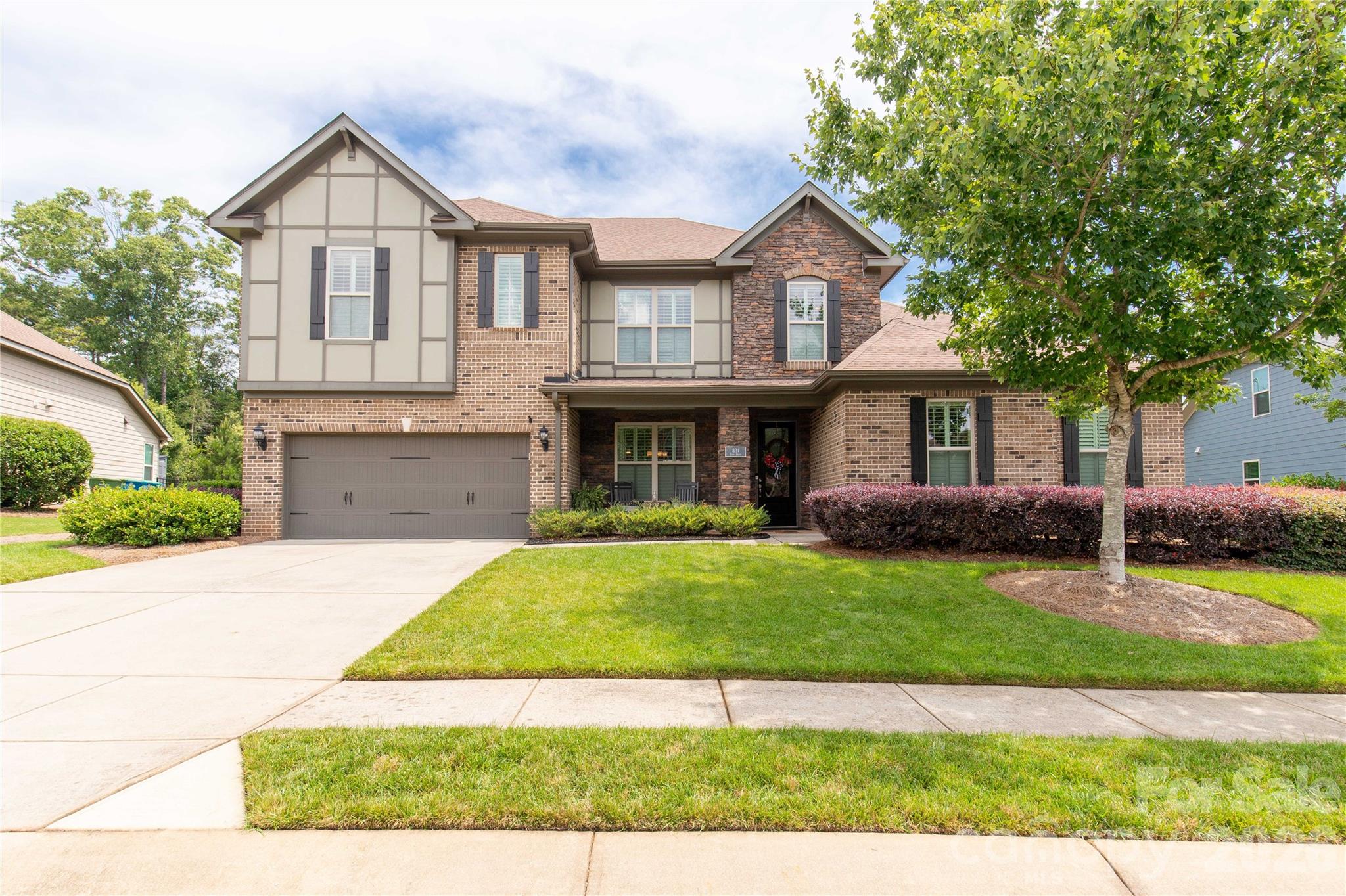 Welcome home to this spacious and meticulously maintained 4-bedroom, 3.5-bathroom gem in one of Fort Mill’s most desirable communities! Step inside to an open layout that impresses with a soaring two-story great room drenched in natural light. The chef’s kitchen takes center stage with its oversized island—perfect for entertaining or casual family meals. The main-level primary suite is a true retreat with a luxurious ensuite, while a versatile office space adds convenience. Upstairs, you’ll find three generously sized bedrooms, two full baths, plus a large sitting room with additional office space for flexible living. Outside, the fenced backyard features a beautifully designed patio with an awning for shade, ideal for relaxing or hosting guests. Set along the scenic banks of the Catawba River, this premier community offers excellent amenities and is just minutes from shopping, dining, and entertainment.