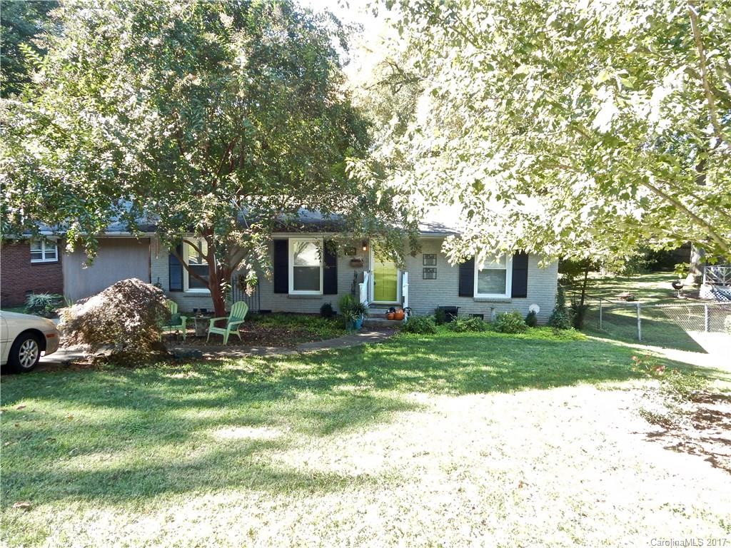 Home features hardwood floors throughout, large den and dining room. Kitchen with all appliances. Remodeled bathrooms. Fully fenced private backyard with large storage building. Close walk to Sedgefield Elementary School. Near shopping and dining. Currently zoned for Myers Park High School in 2017.