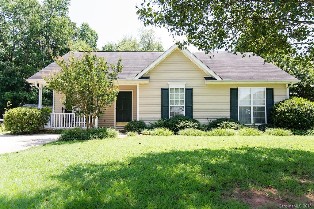 Adorable home in a quiet country setting featuring a large fenced backyard with a wired workshop and covered patio.  This charming home features a covered from porch and a great room with a fireplace and vaulted ceiling. This home comes with new stainless steel appliances.  This home also has access to a community clubhouse and a large community swimming pool and is in a location convenient to shopping, dining and entertainment and is an easy ten minute commute to I-77.