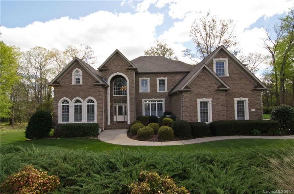 Come home to three levels of luxury in this custom water view home! Wonderful open floor plan is great for entertaining! Spacious master suite on main level with spa-like bath and huge closets. Lower level is nicely finished with versatile rooms, full bath, workshop and tons of storage. Upstairs there are three good sized bedrooms plus a bonus room with wet bar. Fantastic sun porch and screened porch are great places to relax and enjoy the views. Too many upgrades to mention! Clover schools too!