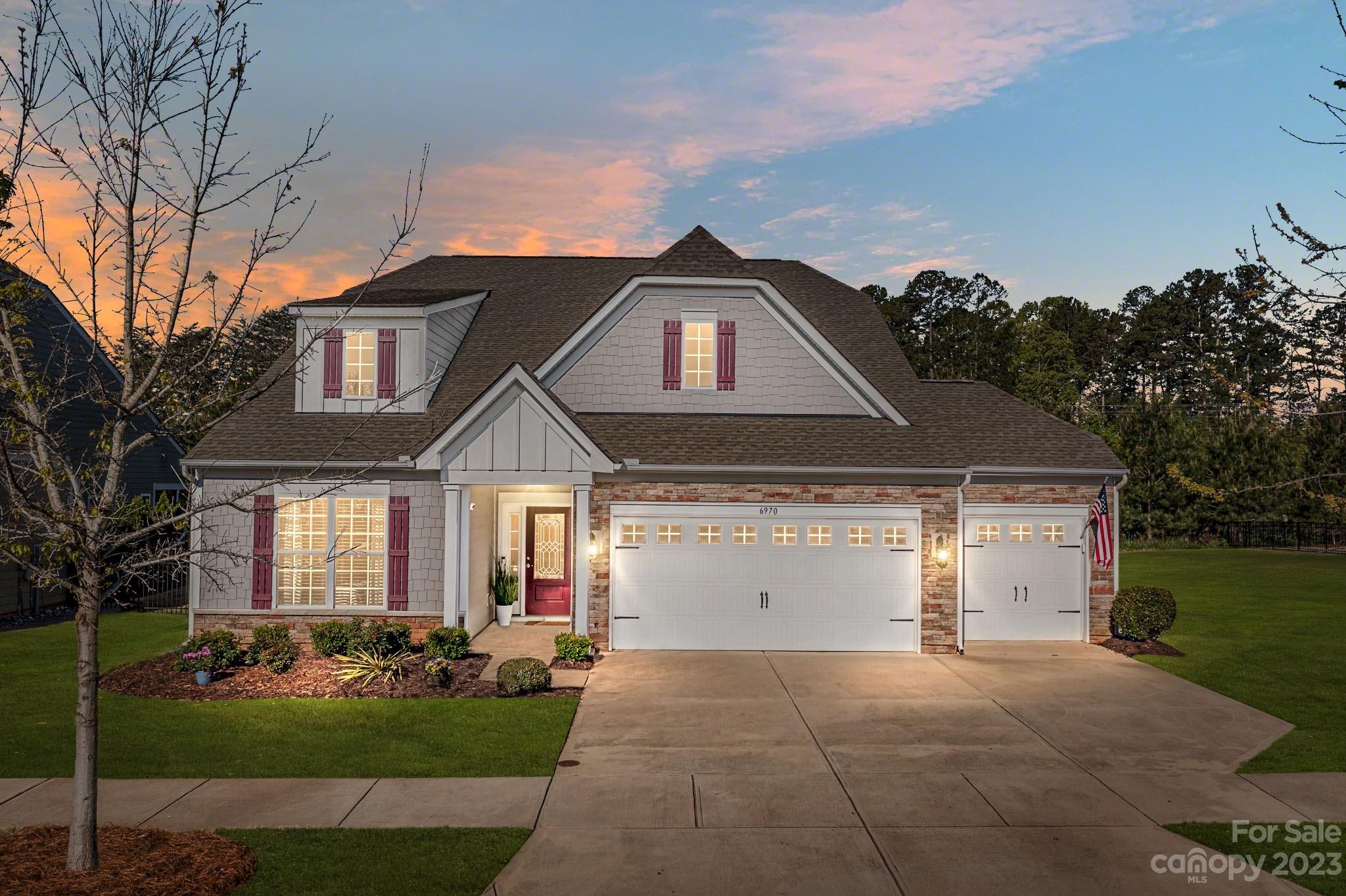 Everything On Your List! Treed Private Back Yard & non-buildable lot next door! 3 Car Garage! Wide Plank Hdwd Flrs! Moldings-First Flr except Laundry & Baths! Gourmet Kit w/Quartz Counters, Large Island w/Single Bowl Sink! Dbl Wall Convect Ovens, Gas Range! Espresso Cabinets w/Designer Hardware! Under Counter Lighting! Subway Tiled Backsplash! Spacious Brkfst Rm! French Doors added to Flex Rm! "Bumped Out" Family Rm for additional Square Feet! Door added to Access Sun Porch! Sun Porch w/"Eze-Breeze" Windows & Porcelain Tiled Floors! Gas Fireplace w/Blower. Customized Larger Mantle & Trim Work! Newer Light Fixtures! Oversized Primary Bedroom w/ Fan and Sitting Room! Fabulous Primary Bath w/ Frameless Shower Door, Tiled Shower with Tiled Accent. Framed Mirrors. Newer Light Fixtures. Customized Staircase enhanced w/ Moldings and Wood Treads! Upper Level Bonus Room & Bedroom.   "Black out" Blinds in most rooms. Tankless Water Heater! Full Yard Irrigation! Extended Patio and Landscaping!