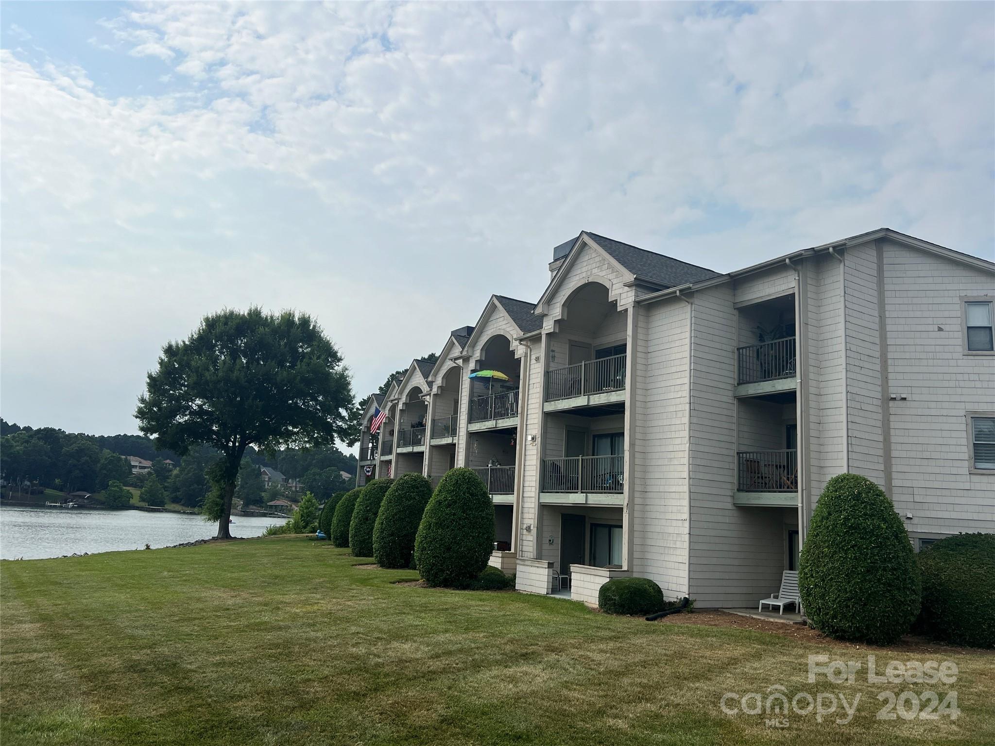Experience luxurious lakefront living in this stunning 2-bedroom, 2-bathroom condo. Enjoy breathtaking lake views from your private balcony. The gourmet kitchen is equipped with granite countertops and stainless-steel appliances, including a fridge, microwave, and dishwasher. The sought after open concept living area is perfect for entertaining and relaxing. There is also an in-unit washer and dryer for your convenience. Indulge in the community amenities by using the pool, gym, dock access and much more. Just minutes away from upscale shopping and dining, with easy access to I-77 for a perfect blend of luxury and convenience!
