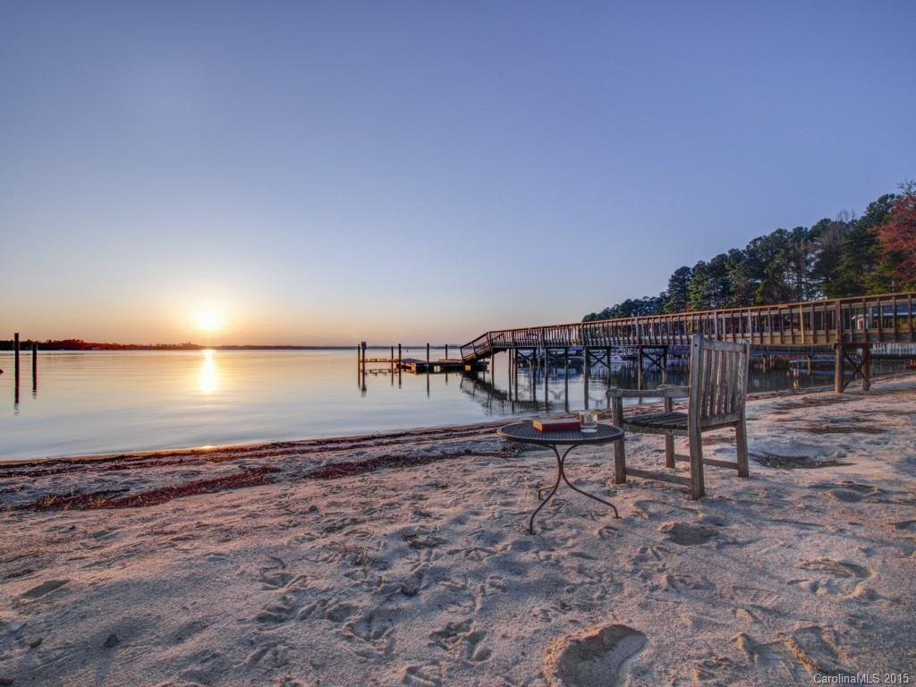 Fabulous Cornelius water front home in exclusive Shearwater Point. Private beach with amazing sunset views, deep water & Pier with low maintenance decking redone in 14'. Newer Trane HVAC 09' & 10', new granite & some new appliances in Kitchen in 09', Master Suite on main level, surround sound speakers in many areas & addt'l BR's & Office upstairs. French doors off Kit/Breakfst open to Screened Porch. Finished Lower Level w/ Rec Room, Wet Bar, Craft Room & Full Bath & unfinished utility/storage.