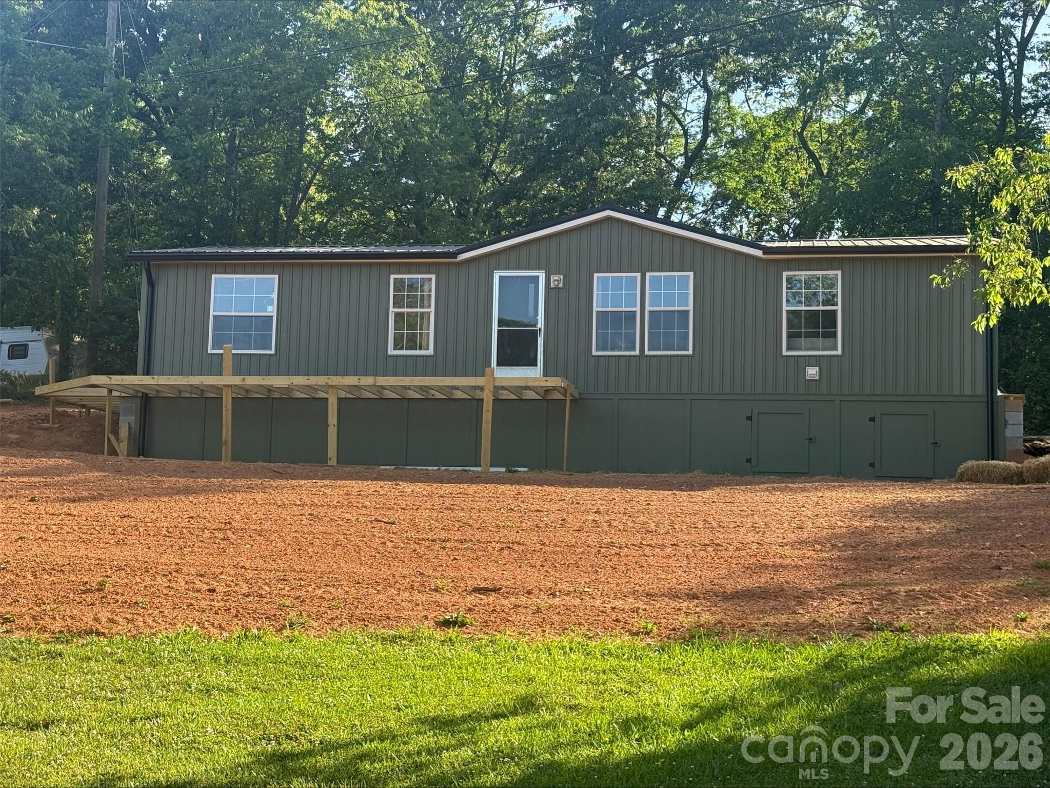 Beautifully updated 24x52 Double Wide  with mountain views
Enjoy comfortable mountain living in this beautifully renovated 24x52 double-wide manufactured home.  The spacious home features an brand new roof, new siding, and fresh paint throughout, giving it a clean, modern look and excellent curb appeal.  Inside you will find a bright and welcoming layout with plenty of living space, while outside you can relax and take in the stunning mountain views on the new spacious partial wrap around deck. The recent updates provide peace of mind and make this home move-in ready!  Great opportunity for anyone looking or an affordable home with modern updates and breath taking views in the mountains.  Schedule your showing today!