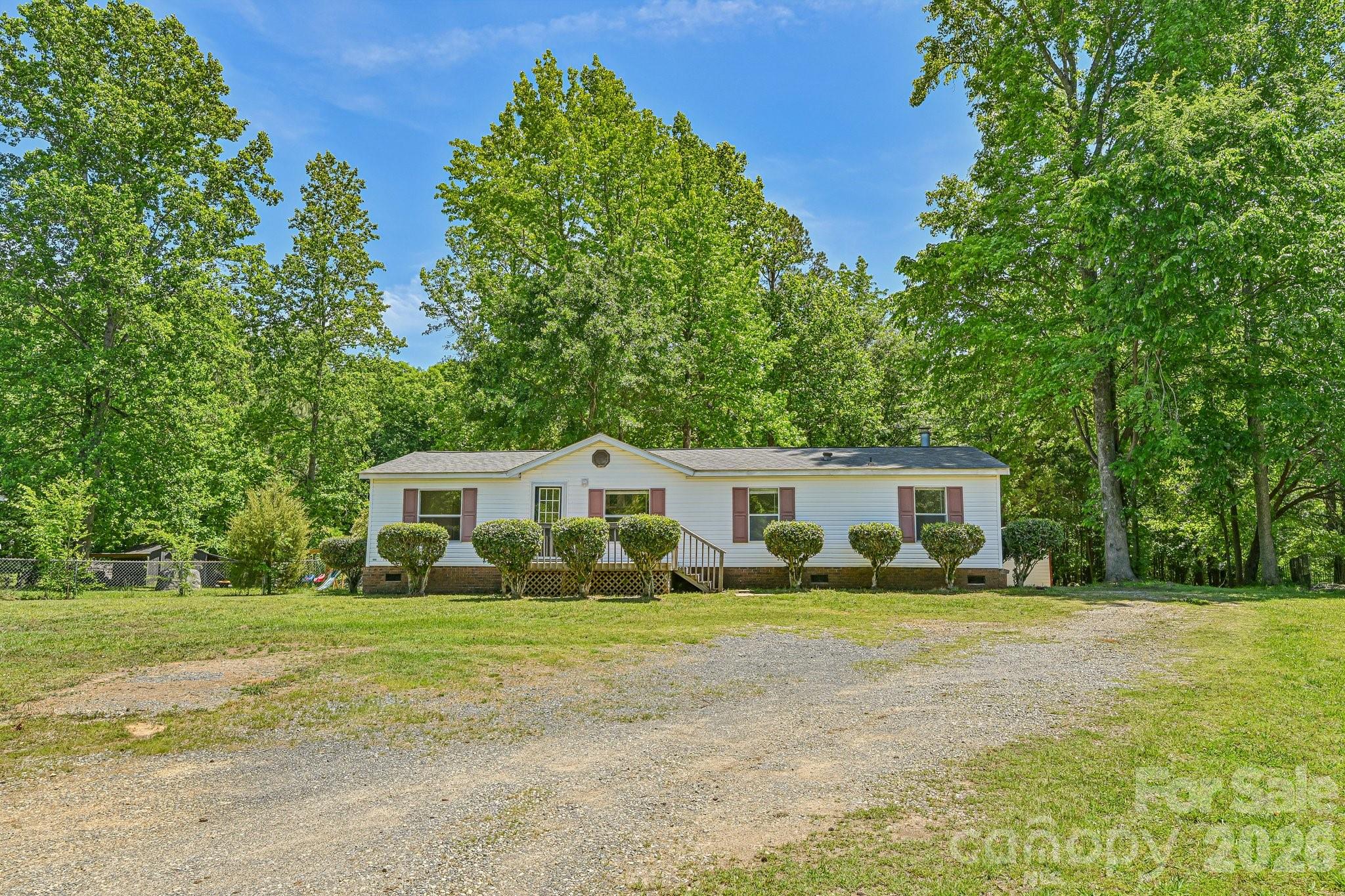 Discover this well-maintained 3-bedroom, 2-bath manufactured home situated on a spacious 1.26-acre lot, just minutes from downtown York. Offering 1,344 square feet of living space, this property provides a great balance of privacy and convenience. The home features a functional layout, a covered carport in the rear for added parking, and a storage shed perfect for tools or extra storage.

Previously used as an investment property, this home comes with a proven rental history, making it an excellent opportunity for investors or buyers seeking a move-in-ready residence with income potential. Enjoy the flexibility of country-style living with easy access to shopping, dining, and local amenities.