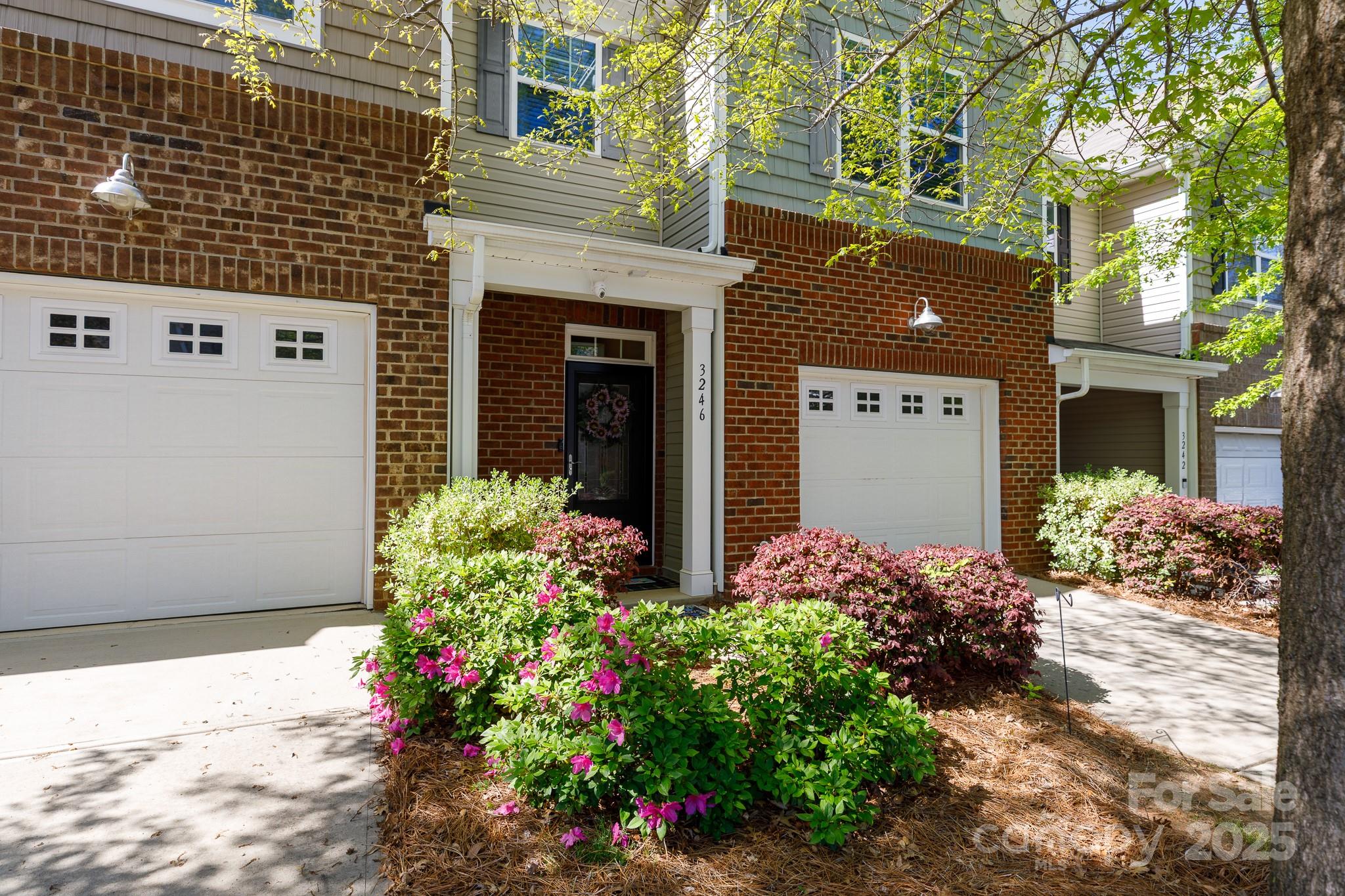 MODERN UPDATES! SCREENED PORCH! LIKE NEW!  This fantastic townhome has all the upgrades you can desire!  The hardwood staircase is new-a stunning feature.  Granite countertops w/ stainless appliances/tons of cabinets, walk in pantry make this kitchen highly functional! Just off the large great room is a dreamy covered screened in porch w/ yard and natural area! RARE find in the community!  Guest bath and closets on main near garage are well positioned. Large primary bedroom has walk in closet, lots of natural light, huge bathroom w/ double vanities/soaker tub/stand up shower. The second br has a large closet big enough for a play area or office! Modern updates:  voice activated blinds in primary br and living room; smart camera system, voice activated lighting  Many new light fixtures, ceilings fans, paint, front door, screened door and SO MUCH MORE (detailed list available upon request)....all located within walking distance of the park and pool!