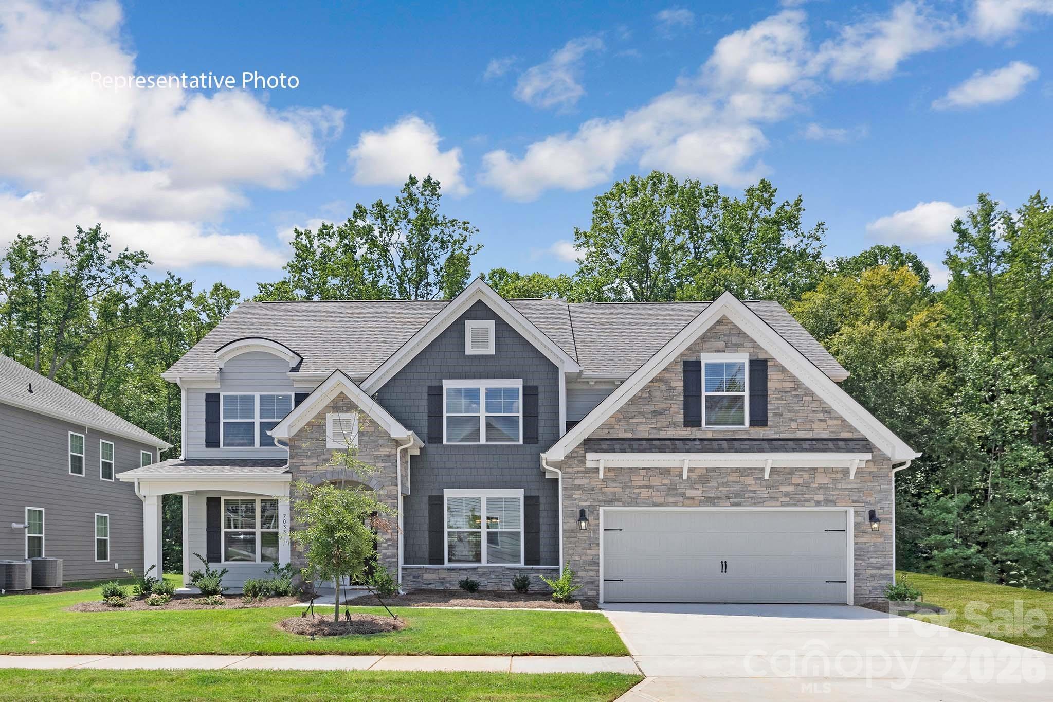 Come see 3085 Eclipse Court located at Sanctuary at Southgate in Indian Trail, NC! This lot backs up to trees and has no neighbor to the right! There are walking trail access to the right of the lot!

The Washington is a two-story home offered at Sanctuary at Southgate in Indian Trail, NC. 

The Washington is a stunning home showcasing impeccable craftsmanship and attention to detail, offering a harmonious blend of style, functionality, and elegance. This home features an open floor plan creating a spacious and inviting atmosphere. This modern two-story home offers five bedrooms, four bathrooms and a two-car garage.

As you step onto the porch and into the home, you’ll be greeted by a grand foyer that integrates the living, dining, and kitchen areas, creating an airy feel. The chef’s kitchen is equipped with stainless steel appliance, large granite countertops with tile backsplash, ample storage space, and a walk-in pantry. Escape to the primary suite, complete with a spacious bedroom area, en-suite bathroom with a soaking tub and shower, and a large walk-in closet. Additional bedrooms provide comfort and privacy for every household member. This home has multiple flex rooms that can be customized to fit your needs.

With its thoughtful design, spacious layout, and modern conveniences, the Washington is the home for you at Sanctuary at Southgate in Indian Trail, NC. 

Pictures are representative.

**Home Under Construction** The Washington offers an open floor plan with a full bathroom and bedroom on the main level. Work or read from the bright main level study. Coffer ceiling in dining room make the already 9 ft ceilings more beautiful! Media/recreational room upstairs is perfect for game or movie nights! Three additional bedrooms and two bathrooms are also upstairs with the primary suite.