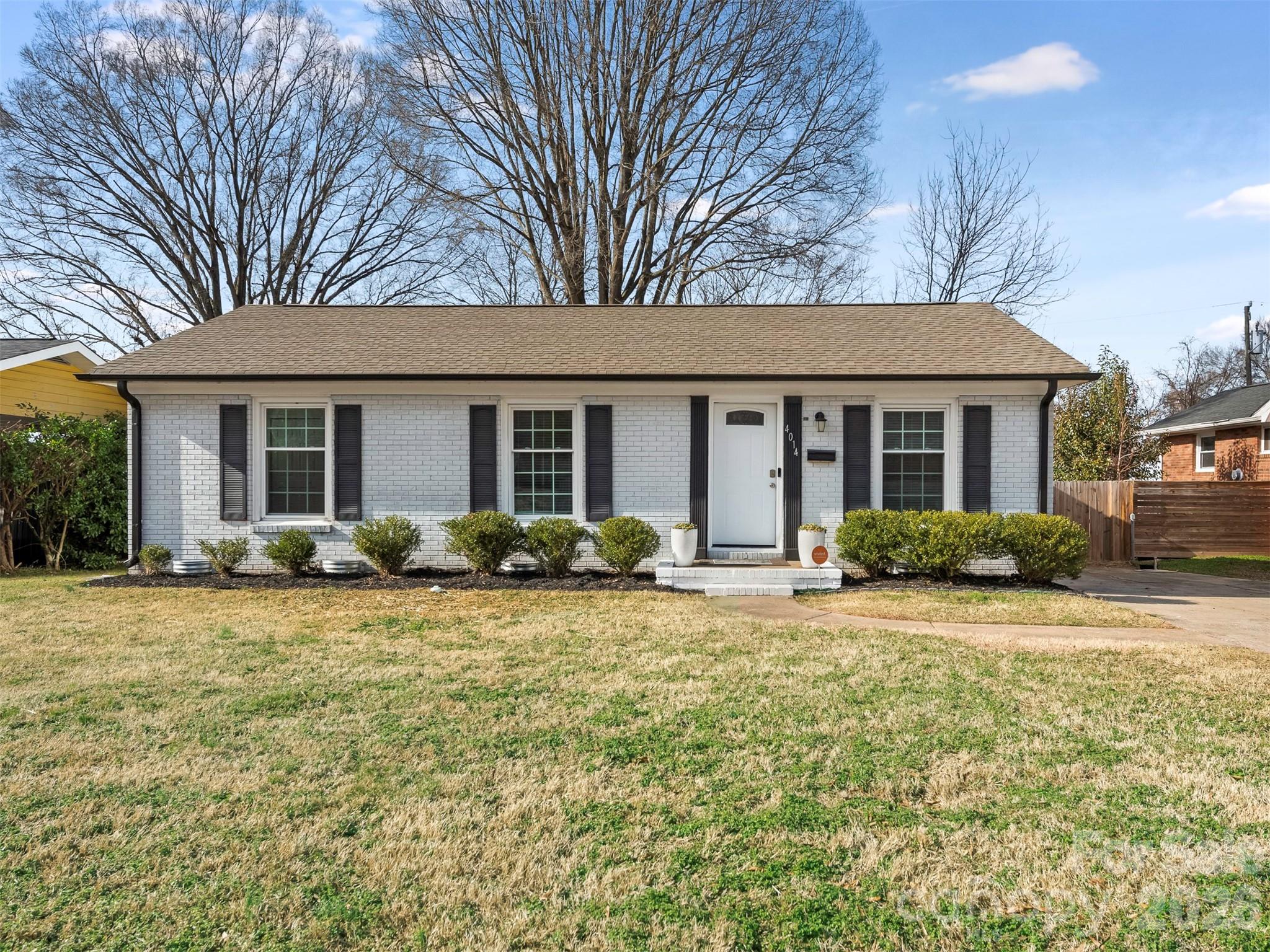 Welcome to 4014 Fieldcrest, featuring 3 bedrooms, 2 baths, and large entertaining spaces. NEW FLOORING IN ALL BEDROOMS. In addition to the main den, this home includes a large room suitable for a game room, office, or additional entertaining area.  The kitchen is equipped with stainless steel appliances, abundant cabinetry, ample counter space, and an open dining layout perfect for hosting family and friends. The extra-large primary bedroom features a spacious walk-in closet and a private bath with a double vanity and a tiled shower. A large flat backyard with a full privacy fence and a deck area that provides space for outdoor entertaining. It is move-in ready with fresh paint, new flooring, and updated fixtures throughout.

Don’t miss this rare move-in-ready opportunity in the evolving Clanton Park/Rollingwood neighborhood. Located minutes from uptown Charlotte, South End’s breweries, restaurants, and boutiques, and Charlotte Douglas Airport. Recreation is also close to home at the 77-acre Clanton Park, which features walking trails, basketball courts, and a playground.