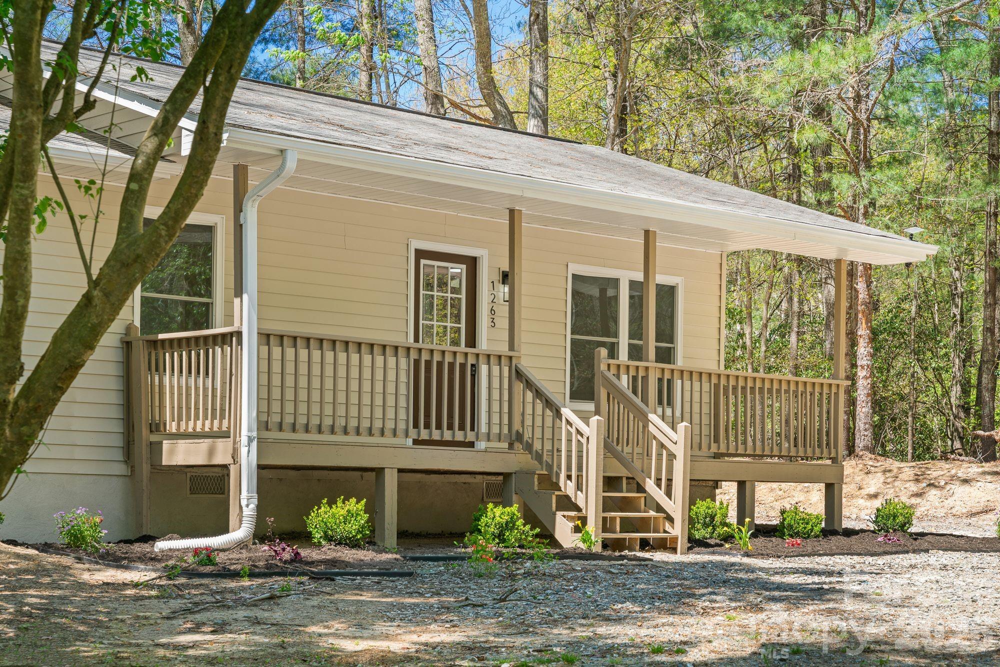 This 3 bedroom, 2 bath home has been updated and is move in ready. Walking in, you’ll immediately notice the fresh paint and new LVP flooring throughout that give it a clean, refreshed feel without trying too hard. The kitchen is one of my favorite parts with white cabinets, soft close features, plenty of storage and a large island that gives you space to cook, host, or just hang out. It’s set up in a way that actually makes sense for everyday living.

The layout flows easily from room to room, with natural light coming in and making the whole space feel open and comfortable. Both bathrooms have been updated with a simple, modern look that feels fresh. The bedrooms are all a good size, which is something you don’t always find at this price point.

If you’re a first time buyer, this is the kind of home that just makes sense. Everything’s already been done, so you’re not walking into a project. You can move in and start enjoying it right away. You’re also just 15 minutes from downtown Brevard, giving you quick access to restaurants, shopping, and everything the area has to offer.