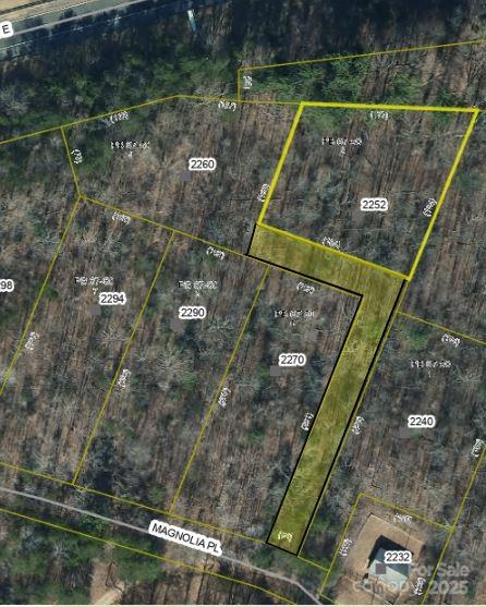 PRIME BUILDING LOTS! Approved for doublewides and modular homes in excellent Morganton location behind Food Lion, just off I-40 Exit 103. These wooded lots range from 0.5 to 2.4 acres with level, build-ready terrain. Select lots feature pre-approved 3-bedroom septic permits (already pre  perked  buyer will be responible for getting permit on lot} with all parcels offering county water access and underground utilities. Road to be paved. Perfect opportunity for your new home in a convenient location with easy interstate access. These parcels offer the ideal blend of natural setting with nearby shopping and amenities. Choose your lot size to suit your needs - build now or hold for future development. Properties like these with utilities and approvals in place are increasingly rare! Call today to select your preferred parcel before they're gone. The  seller is allowing tree and brush buring on lot 9 and 10 to reduce clearing cost all listing agent on details