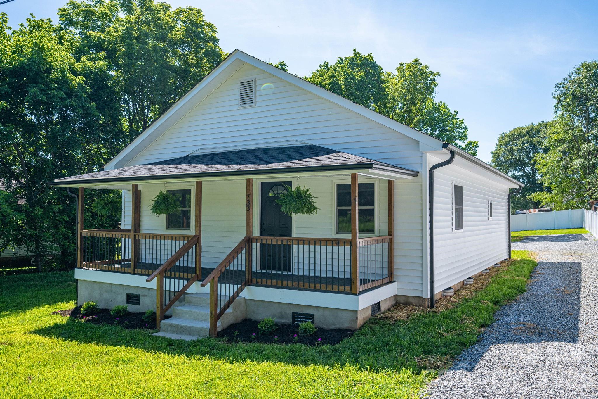 Beautifully Renovated Bungalow on the Southwest Side of Lovable Lincolnton!  Check out this beautifully updated 3-bedroom, 1-bath vinyl bungalow featuring an oversized covered front porch and a prime location just minutes from downtown Lincolnton. Situated just blocks from the Betty G. Ross Recreation Center and the Rail Trail, this move-in ready home offers the perfect blend of modern updates and small-town charm.  Inside, you'll find updates throughout, including a spacious kitchen and dining area with new cabinetry, stainless-steel appliances, and plenty of room for gatherings and everyday living. The tastefully renovated bathroom is centrally located for convenience, while luxury vinyl plank flooring flows throughout the home, creating a warm and welcoming atmosphere.  Step outside and relax on the oversized covered front porch—perfect for entertaining guests, enjoying your morning coffee, or unwinding after a long day. A newly installed stone driveway provides ample parking for residents and visitors alike.  Conveniently located just minutes from Hwy 321, this home offers an easy commute to both the Charlotte and Hickory metro areas while allowing you to enjoy the benefits of small-town living.  Whether you're a first-time buyer, downsizing, or looking for a turnkey property, this home is a fantastic opportunity in a desirable location.  Don't miss your chance to own this beautifully renovated bungalow. Come experience all that Lincolnton has to offer!