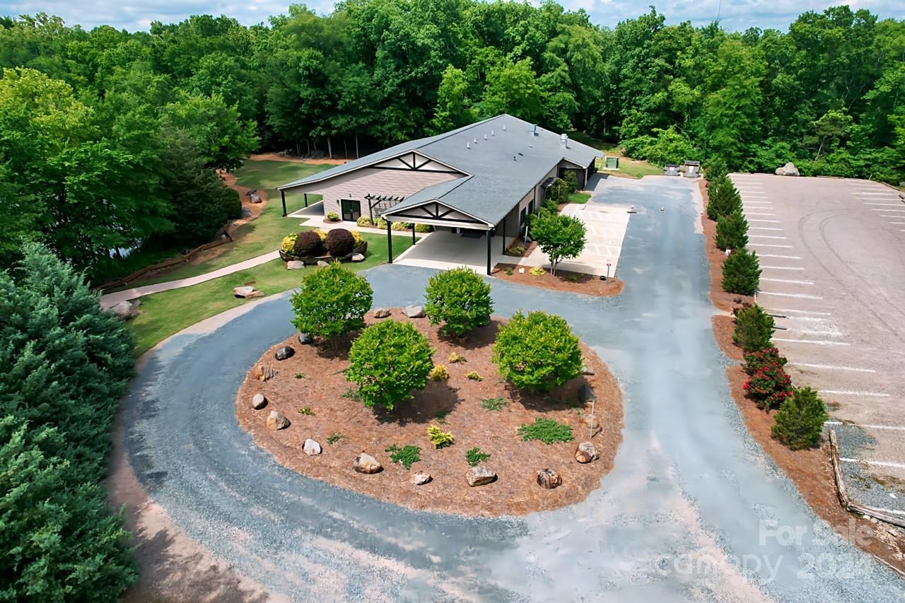 Former wedding venue operated as Riverwood Manor in the charming town of Harrisburg. Ceremonies were performing overlooking the picturesque 7 acre pond and the celebration extends into the almost 8000k Banquet Hall with full kitchen which served as a secondary catering kitchen. Venue is currently closed, leaving exponential possibilities for the new owner. Harrisburg is one of the best kept secrets of NC, positioned in close proximity to Charlotte while still providing a small town feel.