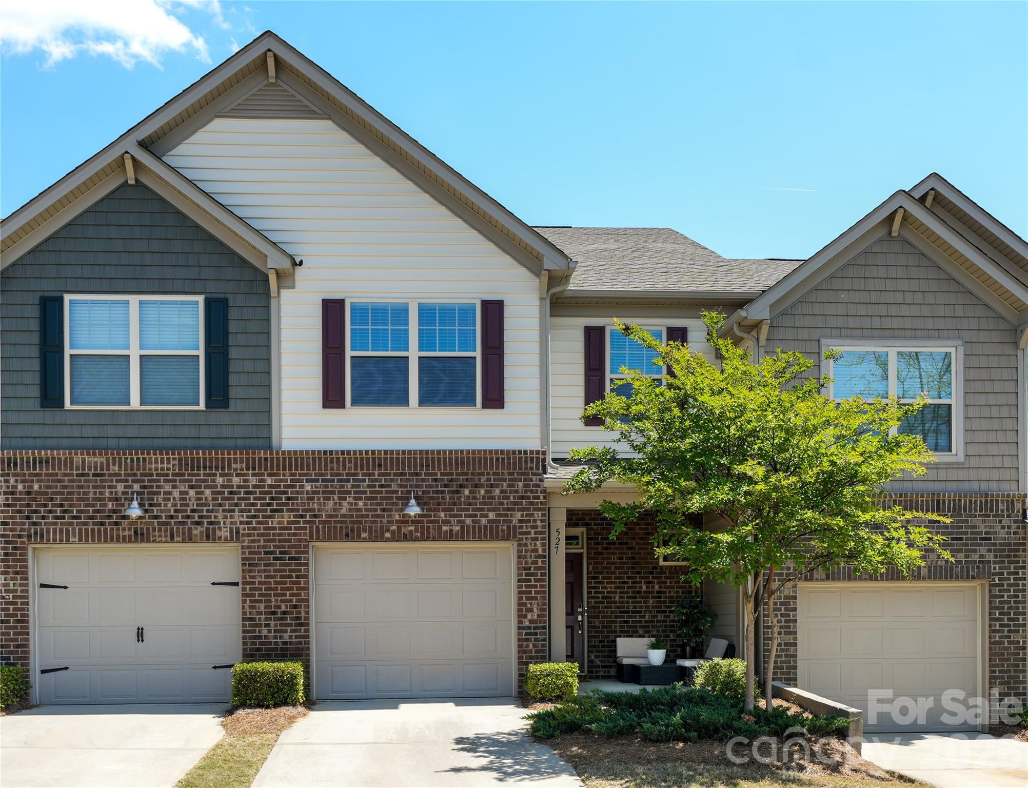 SELLER OFFERING CLOSING CREDIT WITH APPROVED OFFER THIS WEEKEND!

Welcome home to 527 Common Raven Court in the highly sought-after Waterside at the Catawba community in Fort Mill, SC! This beautifully built 3-bedroom, 2.5-bath townhome has thoughtfully designed living space across two stories, constructed by Lennar in 2019 and loaded with quality finishes throughout.
The main level features an inviting open-concept layout with vinyl plank flooring, a gas log fireplace in the family room, and a well-appointed kitchen with walk-in pantry; perfect for everyday living and entertaining. A convenient half bath and one-car garage complete the main floor. Upstairs, retreat to a spacious primary suite with a full bath and walk-in closet, two additional bedrooms, a full bath, and laundry room all designed for functional, comfortable living.
Step outside to enjoy a covered rear porch, enclosed patio, and additional outdoor space ideal for relaxing Carolina evenings.
Waterside at the Catawba delivers resort-style amenities including a fitness center, outdoor pool, tennis courts, playground, walking trails, and recreation areas; all within a beautifully landscaped, master-planned community. Banks Athletic Park, a 25-acre facility within the neighborhood, features four lighted ball fields and a playground.
Your new home is just minutes from I-77 and Highway 160 for an easy commute to Ballantyne, South Charlotte, and Charlotte Douglas International Airport. Shopping, dining, and everyday conveniences are right outside the community entrance.