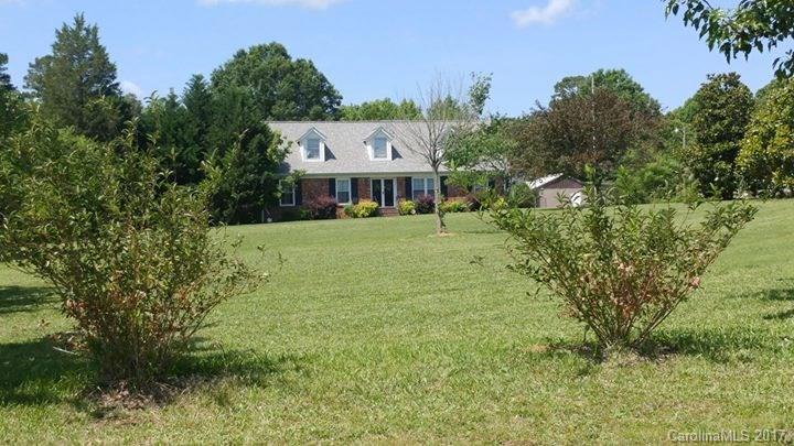 Pretty brick 1 1/2 story home with 5 bedrooms 3 baths, Greatroom, formal dining, kitchen/breakfast, sunroom, laundry, huge deck and in ground pool on 3.9 acres in the country.. Huge workshop for Dad, beautifully landscaped, great home for the growing family. Bring your boat, RV or horse you can park them all here. No HOA's ! Lady in home had a disabeling stroke and is not able to take care of the pool, will have everything up and running on it before closing.
