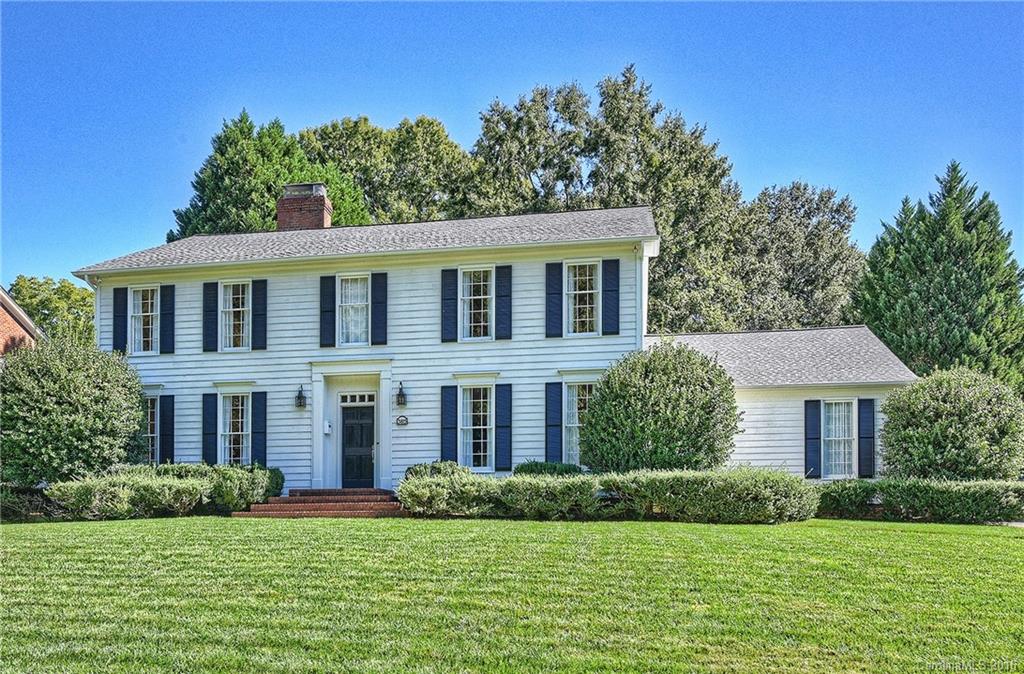 Opportunity time!  This great family home with excellent school assignments sits on an elevated half-acre+ lot on a wide, picturesque boulevard and features a huge private, wooded, fenced/gated back yard, 9' ceilings, beautiful hardwood floors, large foyer with pretty staircase, lovely formal areas, 3 fireplaces including big Family Room with large windows and gas logs fireplace and Master Bedroom with fireplace, 2-car rear-loading garage with plenty of extra parking space and MORE!