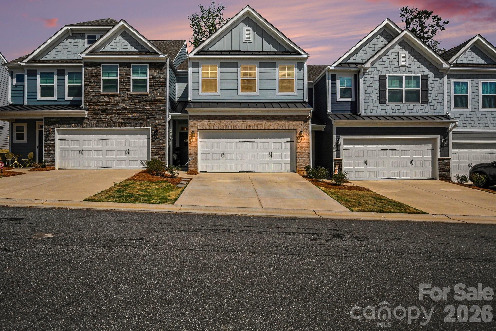 This like-new townhouse in desirable Harbor Crossing stands out with numerous custom upgrades throughout. Thoughtfully designed craftsman-style built-ins add both character and practical storage, while the electric fireplace creates a cozy, stylish focal point. The open-concept layout is filled with natural light, giving the home a bright and welcoming feel. Upstairs, the spacious primary suite features elegant tray ceilings and a private en-suite bath with a tiled shower and dual vanities. The secondary bathroom includes a tub/shower combination and dual sinks, perfect for convenience. Two additional bedrooms, a versatile loft space, and a dedicated laundry room provide plenty of room for comfortable living. Will not last long!