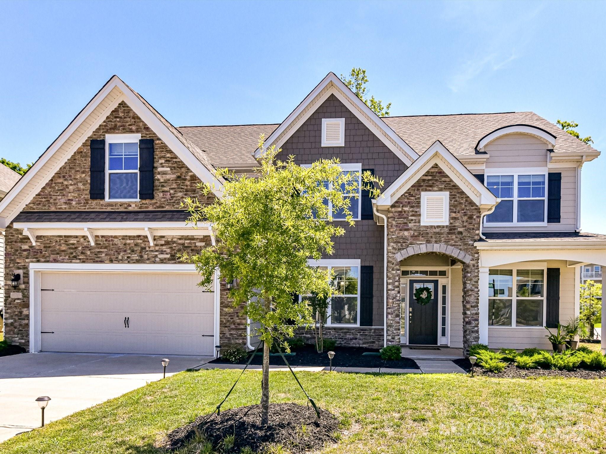 Fall in love with this picture-perfect home located in the popular Avondale community close to Ballantyne, shopping, restaurants & entertainment. Just 2 years old this lovely home is full of Designer Upgrades! Huge Gourmet Kitchen complete with quartz countertops & island, gas cooktop, double wall oven & an abundance cabinets. A 1st floor guest suite with full bath. Private office with glass French doors. Large open floorplan Great Room with stone fireplace surrounded by built-in cabinetry.  A sunroom off the kitchen area, beautiful hardwood floors, butler’s pantry and a drop zone.  Upstairs you will find the spacious primary bedroom with an amazing walk-in closet plus 3 other bedrooms and a large bonus room. Outdoors enjoy a fully fenced backyard with extended patio across the back of home w/ gazebo and a raised bed garden. Plus, a community with resort style amenities including a pool, clubhouse & sports facilities.