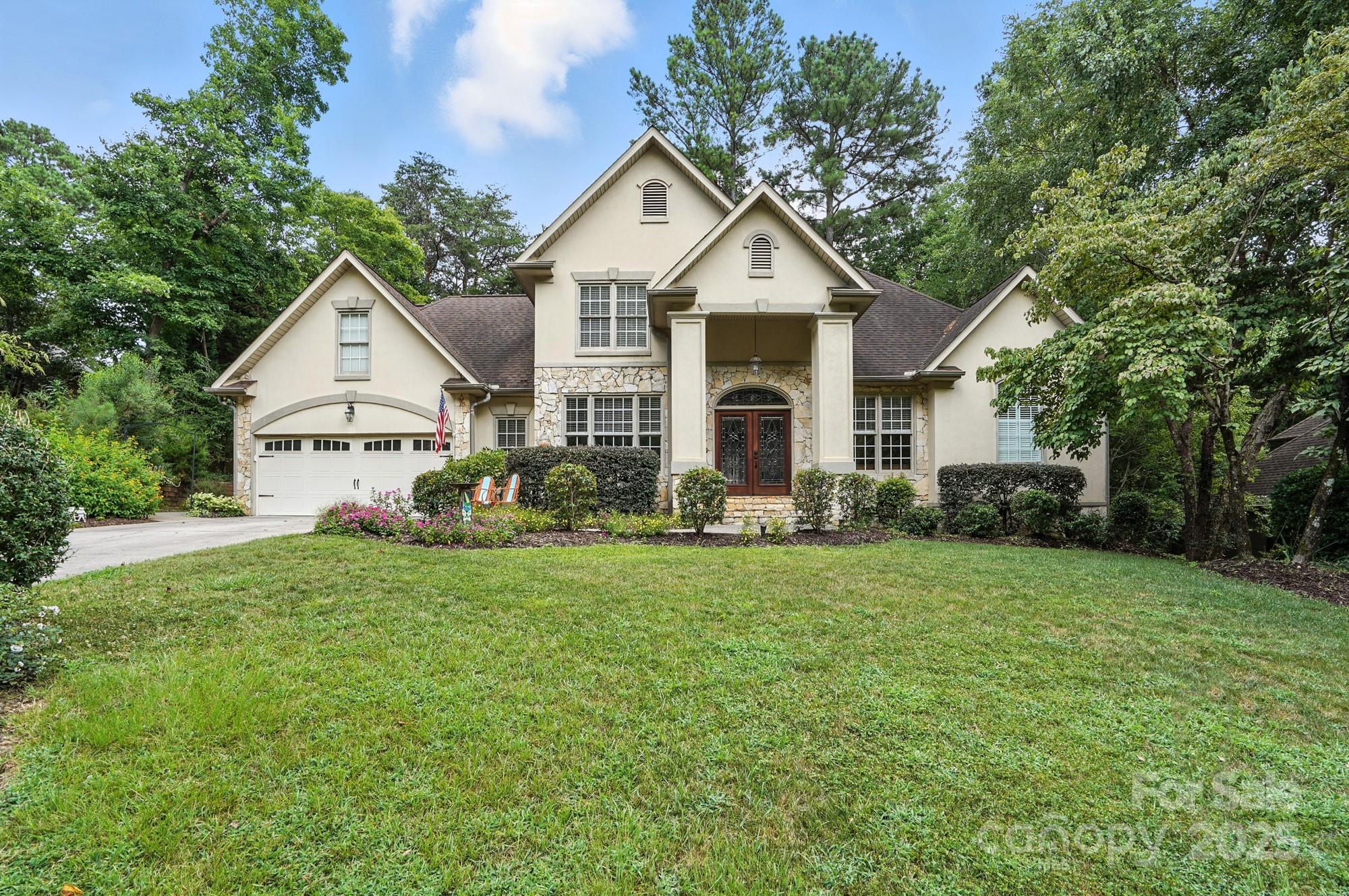 RARE FIND on the peninsula of Tega Cay located on Lake Wylie! Unwind in your own backyard oasis & beat the heat in the sparkling in-ground pool & large patio surrounded by lush greenery, shade trees & an outbuilding w/ a half bath for guests. Inside, enjoy the versatility of a split bedroom plan w/ the primary suite on the main, 2x more bdrms up & a 4th bdrm that doubles as a huge bonus room. You will also find a loft that adds add'l living space or use as a home office! An oversized epoxy floor garage is perfect for larger vehicles, toys, tools, or a workshop & the custom built in sauna will convey. Home has tons of storage w/multiple attic spaces & walk-in closets. High ceilings, second story great room with built ins for storage & display, new engineered flooring in 4th bed/bonus & crown moldings enhance the home's charm. Come enjoy an amenity rich community to include parks, lake w/ boat ramp & marina, walking/ biking trails, outdoor pool, golf, tennis, pickle ball & so much more!