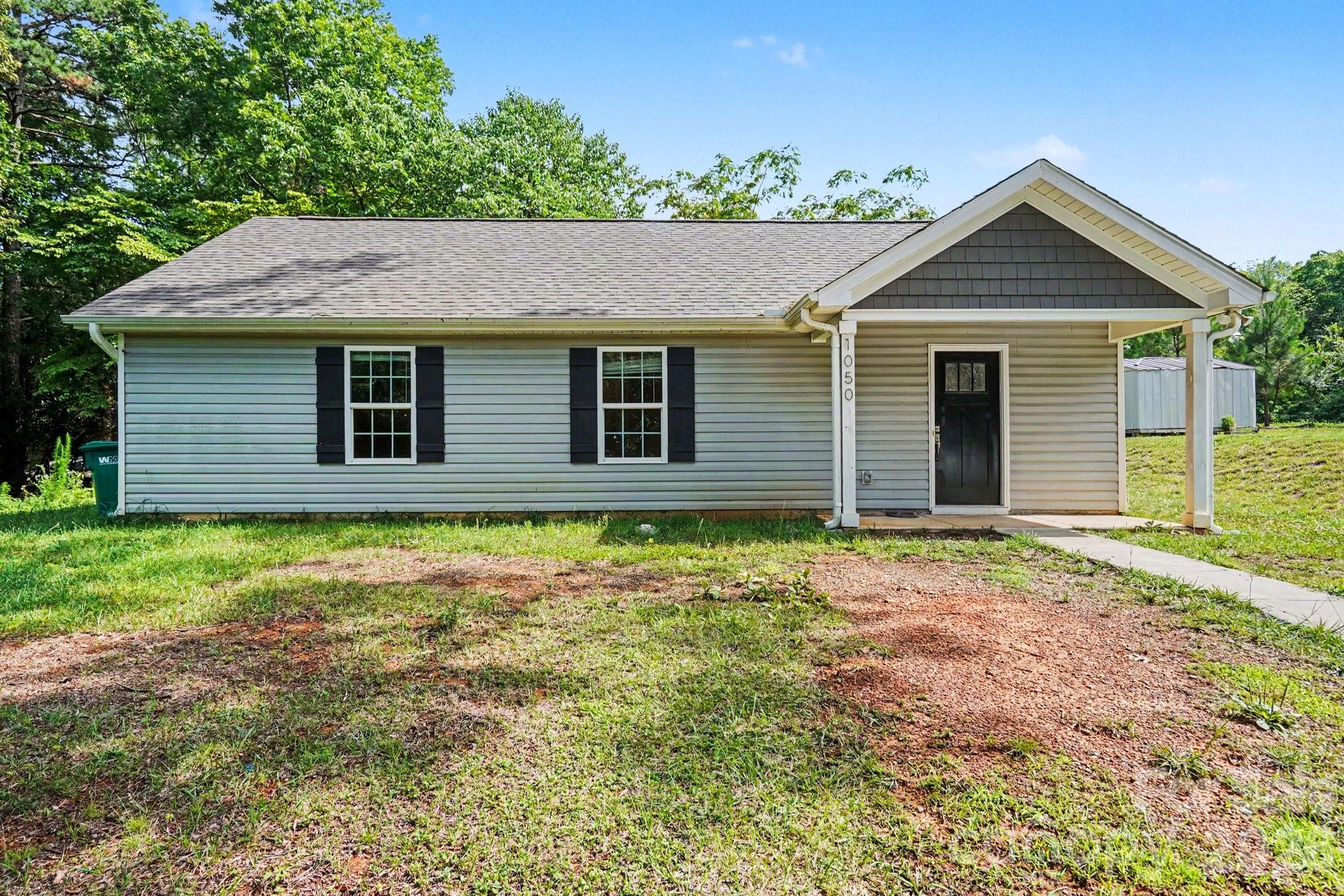 RUSH to your new home. Recently vacated, freshly painted, and ready for its new owners! The 1,134 sq ft home offers a smart, single-level layout with 3 bedrooms, 2 full bathrooms, and an open kitchen/dining/living area, all on the main floor for easy upkeep. NO HOA! Less than a mile from Walmart, Lowe's, Chick-fil-A, and Starbucks, about 1.5 miles from downtown Albemarle, and 2.6 miles from Albemarle High School. Several new developments nearby — including the 282-acre Albemarle Business Center, a major manufacturing and jobs hub in progress — along with multiple new home builds popping up in the surrounding neighborhoods, signaling strong upside potential for property values.