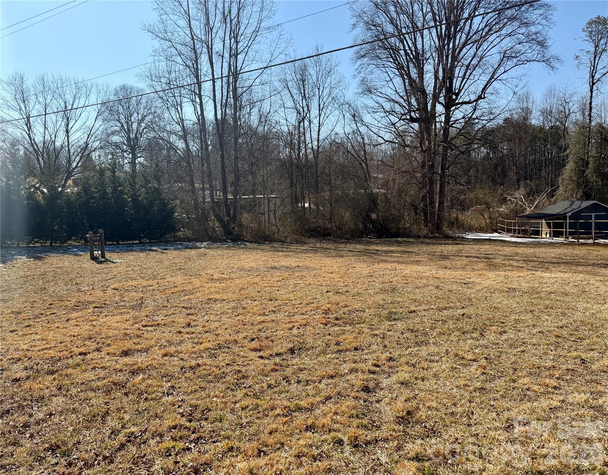 This .43-acre lot offers a fantastic opportunity to build or place the home you want, with almost the entire property already cleared and ready to go. A septic system is already installed, saving you time and upfront costs, and the property has public water access available. One of the biggest perks? No land restrictions. Whether you’re planning to place a manufactured home, build a site-built house, or explore other possibilities, you have the freedom to make this property your own. With key utilities in place and flexible use options, this lot is ideal for a primary residence, investment, or future development. Bring your plans and take advantage of this ready-to-use piece of land.