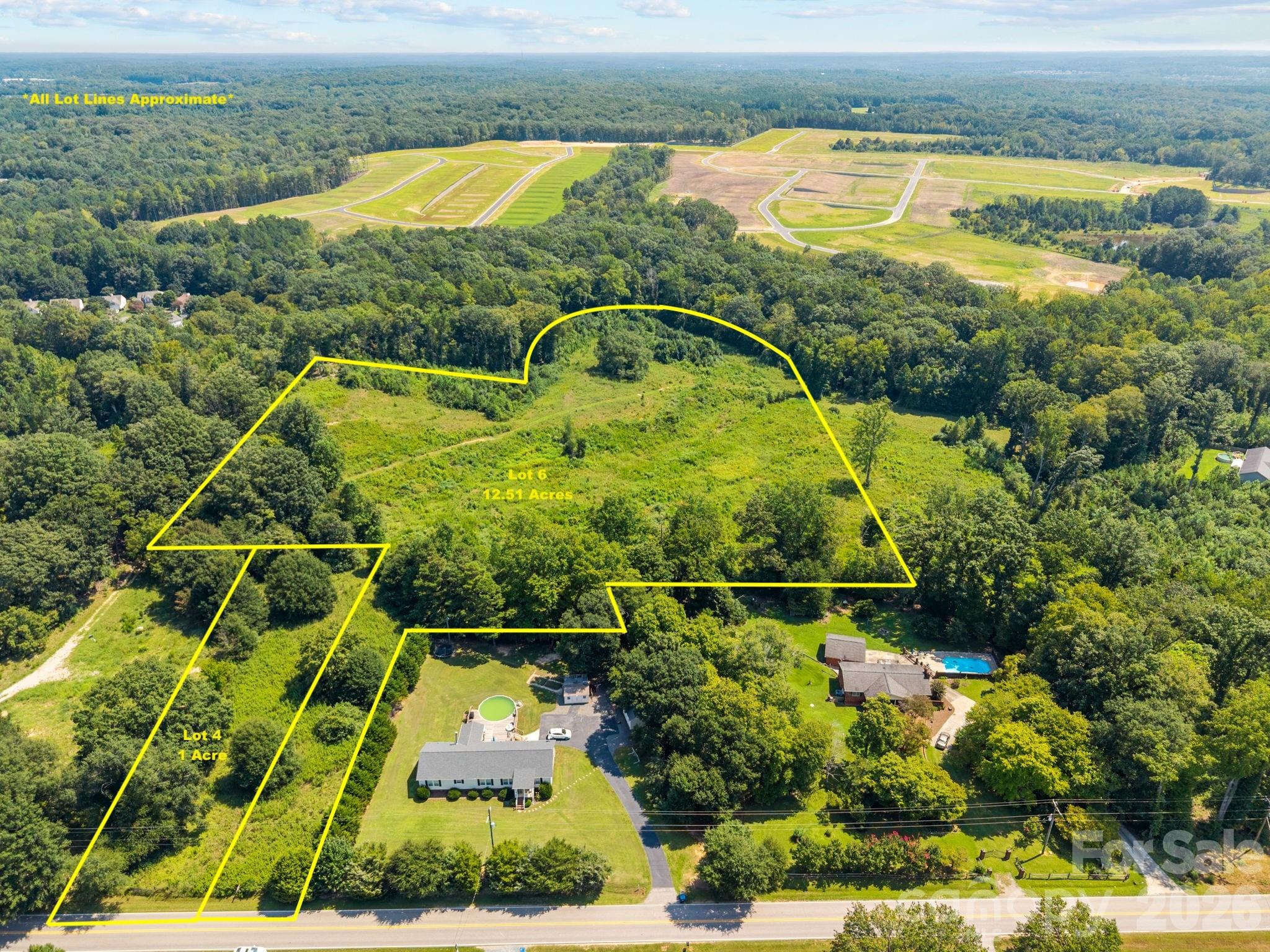 Come build your dream home on this beautiful 12.51 Acre lot in Fort Mill! This lot is located just minutes from Marvin and Waxhaw across the State Line so save yourself some money on taxes but enjoy all the benefits of the area! Shopping, dining, parks and trails are all just minutes away and you're less than a 30-minute drive to Downtown Charlotte, 20 minutes to Downtown Fort Mill, and 15 minutes to Downtown Waxhaw! The lot has been perked and permitted for a 5-bedroom septic so the sky's the limit on what you can build! Looking for a family compound or additional lots for building or investment? 5 additional lots are available all with 5-bedroom septic options totaling over 25 acres. Schedule a showing today or contact the agent for more information. *Ground Photos are of all lots, drone photos will be available soon*