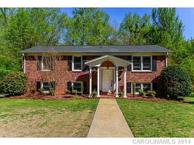 OWNER FINANCING!  Like New, this 2 Story Brick Home w/4BR & 3 BA offers Eat-in Kitchen w/granite C-Tops, SS Appl. & HW Floors Up&Down. Lg. Master w/Walk-in Closet & En-suite w/HH sinks, Vanity & Soaking Tub.  Spacious Family Room opens to Private back yard buffered by Wilderness. Use Oversized BR down as/is or Rec-room. Huge Brick Carport w/Storage Room. Close to Shops & Great Schools. Motivated Seller!