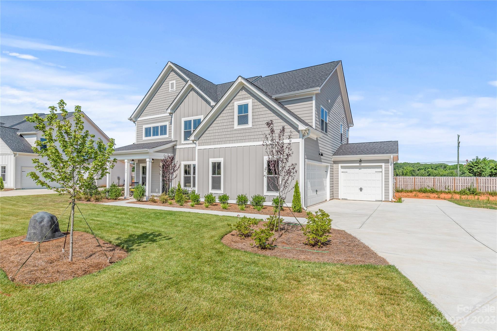 QUICK MOVE IN!!!  $20,000 incentive to be used any way you want if written and accepted by 1/31/2024.   Fairfax is an exclusive enclave of just 10 homes on a cul-de-sac, located on the highly sought after Brawley School Peninsula.  The Millstone II is an open & airy floorplan that lives large.  Huge Gourmet Kitchen with Large Walk-In Pantry and Oversized Dining.  Open to the 2-Story Great Room.  Flows perfectly for entertaining or everyday living.  Separate Office/Flex Room & Private Guest Suite on the main level.  Second floor luxury Primary Suite & 3 Spacious Secondary Bedrooms.  3-Car Garage & Large Flat, Fenced Rear Yard. Lots of designer upgrades including, Wainscot in Flex Room. Custom wall Powder Room.  Great Room built0ins, & Mudroom Drop Zone.  Home has been professional staged.  Furniture does not convey.
