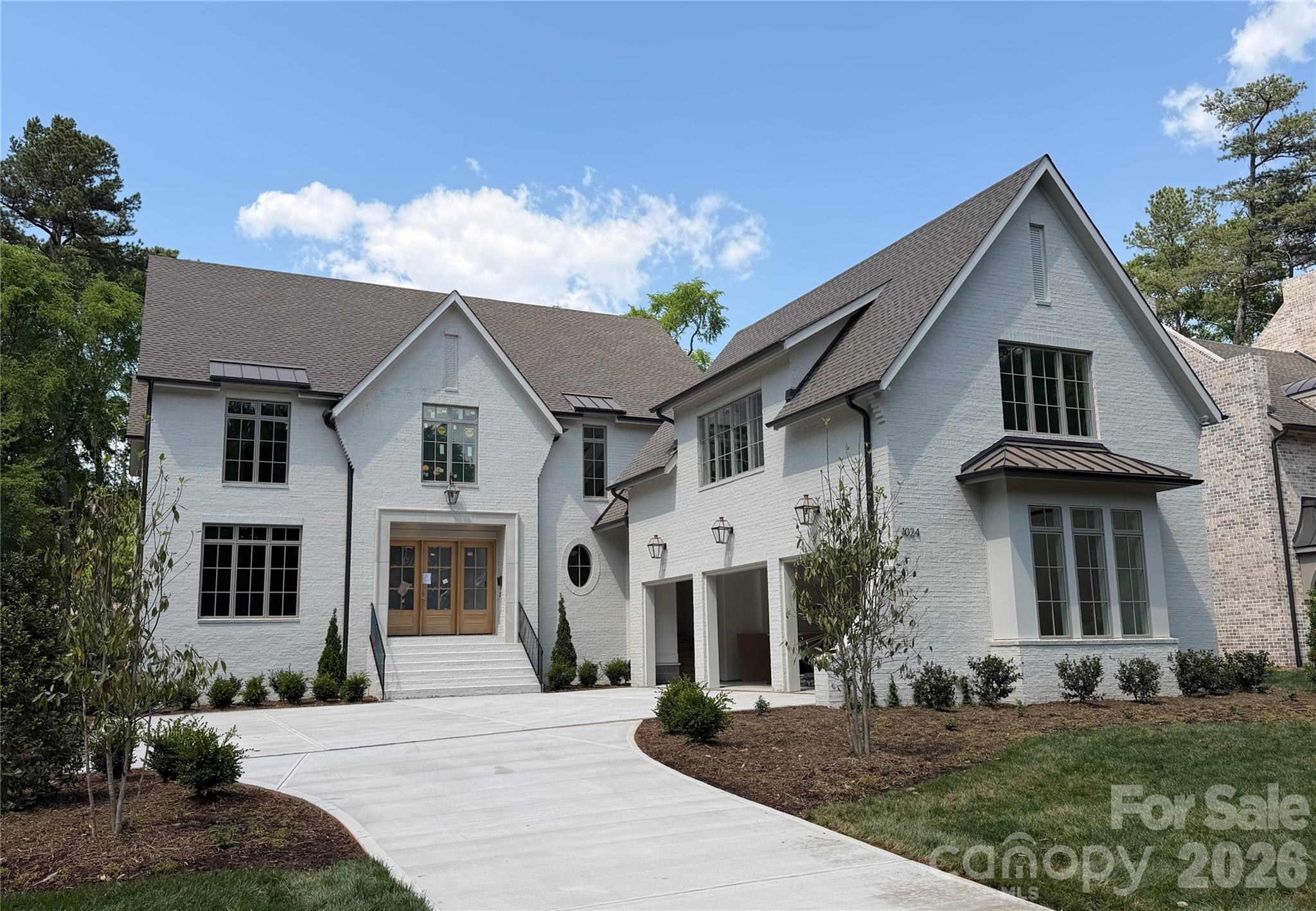 Schedule your showing today.  Completion late May.  Gorgeous new construction by THR Design Build on .54 acre lot in Jefferson Park. One of a kind custom built two story home with large three car garage. This ENERGY STAR home includes 5,421 sf, 5 bedrooms, 6.5 baths, 1 powder room, a bonus room, office, 2 fireplaces, a 3 car garage (906 sf), and prewired for electric car. Stunning entryway with office to the left and drop zone to the right, continue on to the open family room and kitchen. The open space expands through the 16 ft slider doors onto the 331 sf covered, screened in porch with fireplace. A thoughtfully designed kitchen includes 48" Thermador Dual Fuel range below hand crafted hood, 42" Thermador refrigerator, and Theramor dishwasher. The Scullery includes a farmhouse sink, undercounter wine cooler, Cafe series 36" refrigerator, dishwasher, and microwave drawer. Other features include oversize Pella windows and doors, dual Trane high effic heat pumps, and 2 Rinnai tankless WH. 10 foot ceilings on the main level and 9 foot celings on the upper level. Expansive primary suite with washer/dryer hookup in the closet. Close to Providence Day, Country Day, The Fletcher School, and Charlotte Prep.