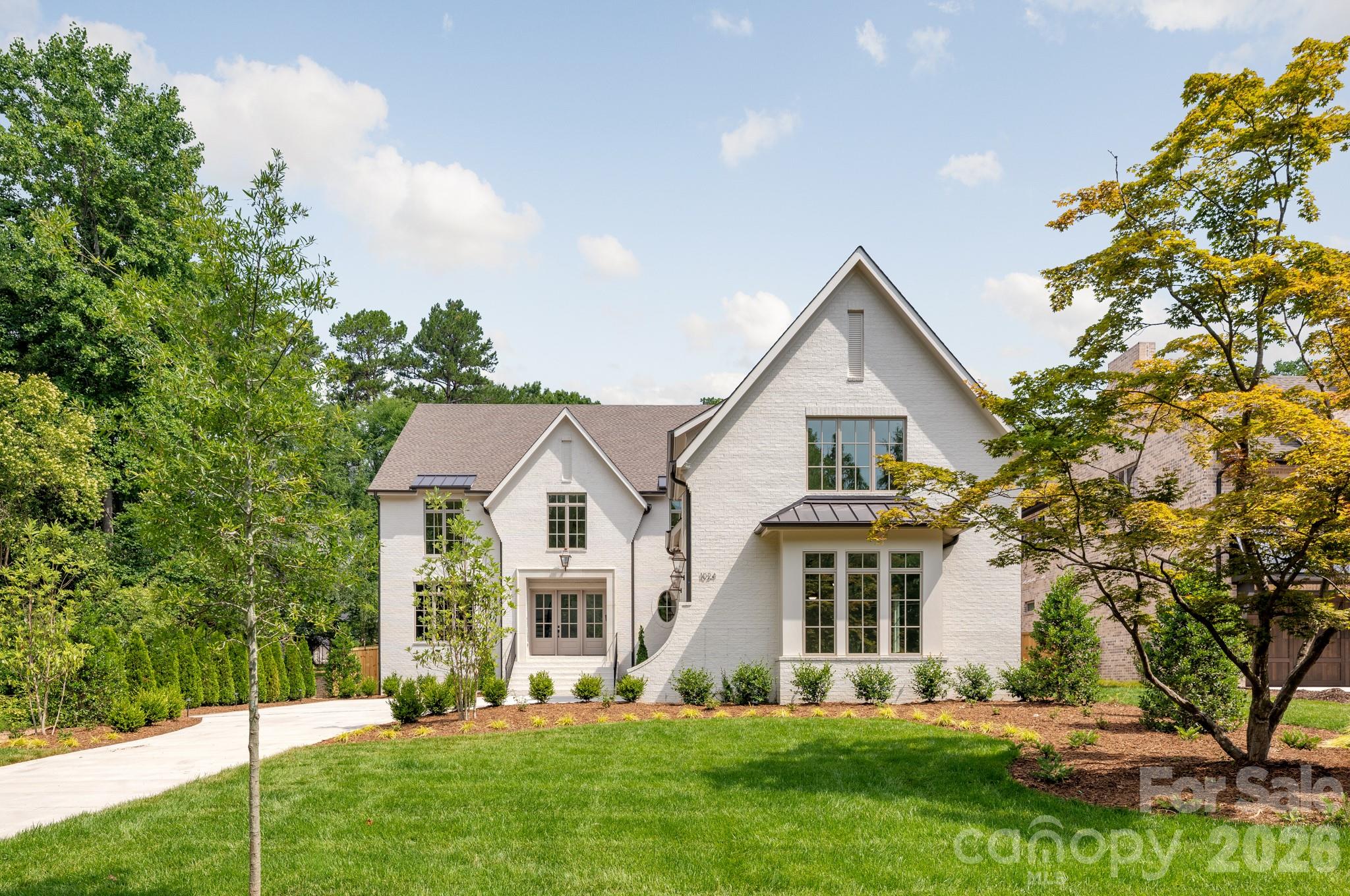 Schedule your showing today.  Completion late May.  Gorgeous new construction by THR Design Build on .54 acre lot in Jefferson Park. One of a kind custom built two story home with large three car garage. This ENERGY STAR home includes 5,421 sf, 5 bedrooms, 6.5 baths, 1 powder room, a bonus room, office, 2 fireplaces, a 3 car garage (906 sf), and prewired for electric car. Stunning entryway with office to the left and drop zone to the right, continue on to the open family room and kitchen. The open space expands through the 16 ft slider doors onto the 331 sf covered, screened in porch with fireplace. A thoughtfully designed kitchen includes 48" Thermador Dual Fuel range below hand crafted hood, 42" Thermador refrigerator, and Theramor dishwasher. The Scullery includes a farmhouse sink, undercounter wine cooler, Cafe series 36" refrigerator, dishwasher, and microwave drawer. Other features include oversize Pella windows and doors, dual Trane high effic heat pumps, and 2 Rinnai tankless WH. 10 foot ceilings on the main level and 9 foot celings on the upper level. Expansive primary suite with washer/dryer hookup in the closet. Close to Providence Day, Country Day, The Fletcher School, and Charlotte Prep.