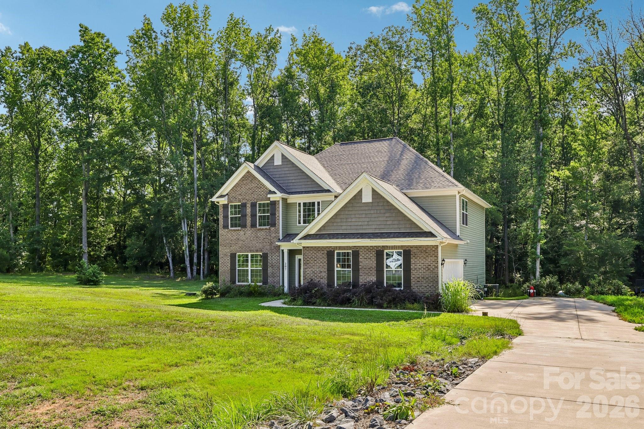 Built in 2023 and situated on a spacious .93-acre lot, this beautiful home offers the perfect blend of comfort, convenience, and small-town charm. The open-concept kitchen features granite countertops, a subway tile backsplash, and a large peninsula overlooking the family room. The main level also includes a private office, flexible living space, and a full bath. Upstairs, you'll find a spacious primary suite, three additional bedrooms, ample storage, and a convenient laundry room.

Best of all, you're just minutes from charming downtown Waxhaw, known for its historic character, locally owned shops, popular restaurants, breweries, seasonal festivals, farmers markets, and vibrant community atmosphere.