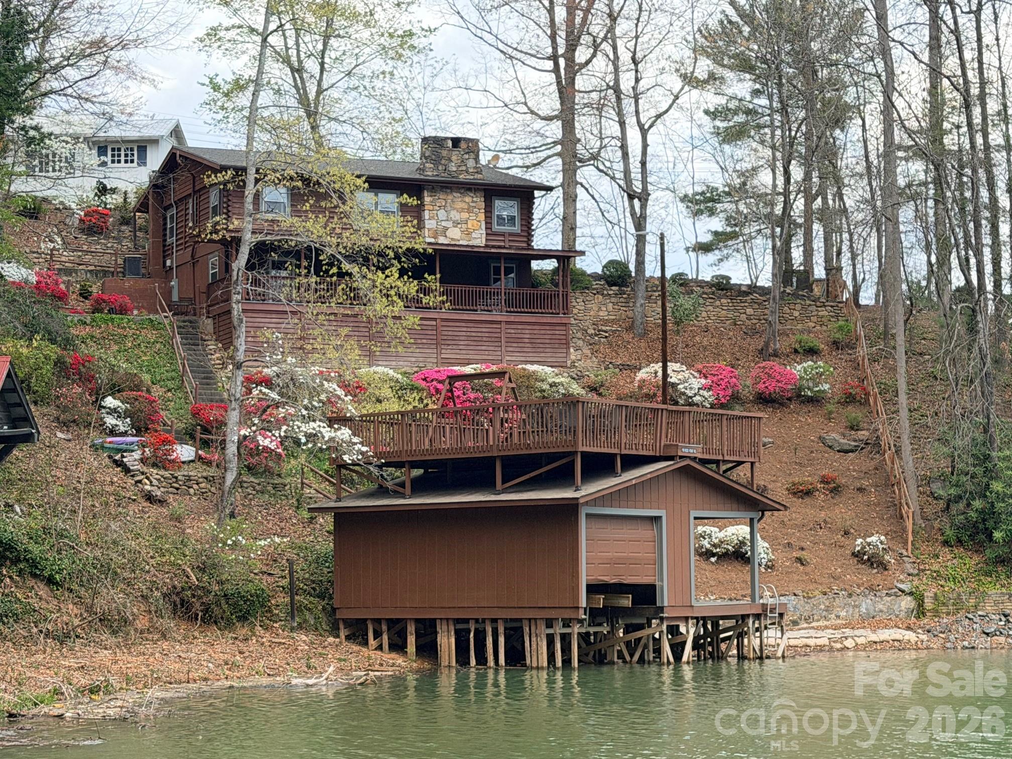 Lake Lure Lakefront...........Rare opportunity to buy a fully furnished, 4 bedroom, 2 1/2 bath, lakefront home on Lake Lure for only $1,000,000. This vintage home is in great condition and is located in a private cove away from the busyness of the main channel. Located just off Picnic Point on Rock Point Road and just 3 minutes to Ingles Grocery. This Gem will not wait, so buy while it's available!
