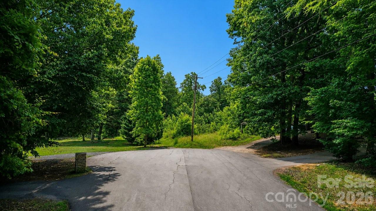 Build your dream home on this beautiful 2.4-acre lot in the highly desirable Fort Mill area! This partially cleared homesite offers the perfect balance of privacy and natural beauty, with mature trees surrounding the property and a peaceful creek along the rear boundary. The sloping topography makes it ideal for a custom basement home with endless design possibilities.

The property already has a well and septic system in place, saving valuable time and development costs. Previously perked for a 4-bedroom home, this lot is ready for your vision. Enjoy the freedom of NO HOA restrictions while still being conveniently located near shopping, dining, top-rated schools, and major commuting routes.

The lower portion of the property remains wooded, and the lot backs to a creek that extends into a flood zone at the rear of the property.